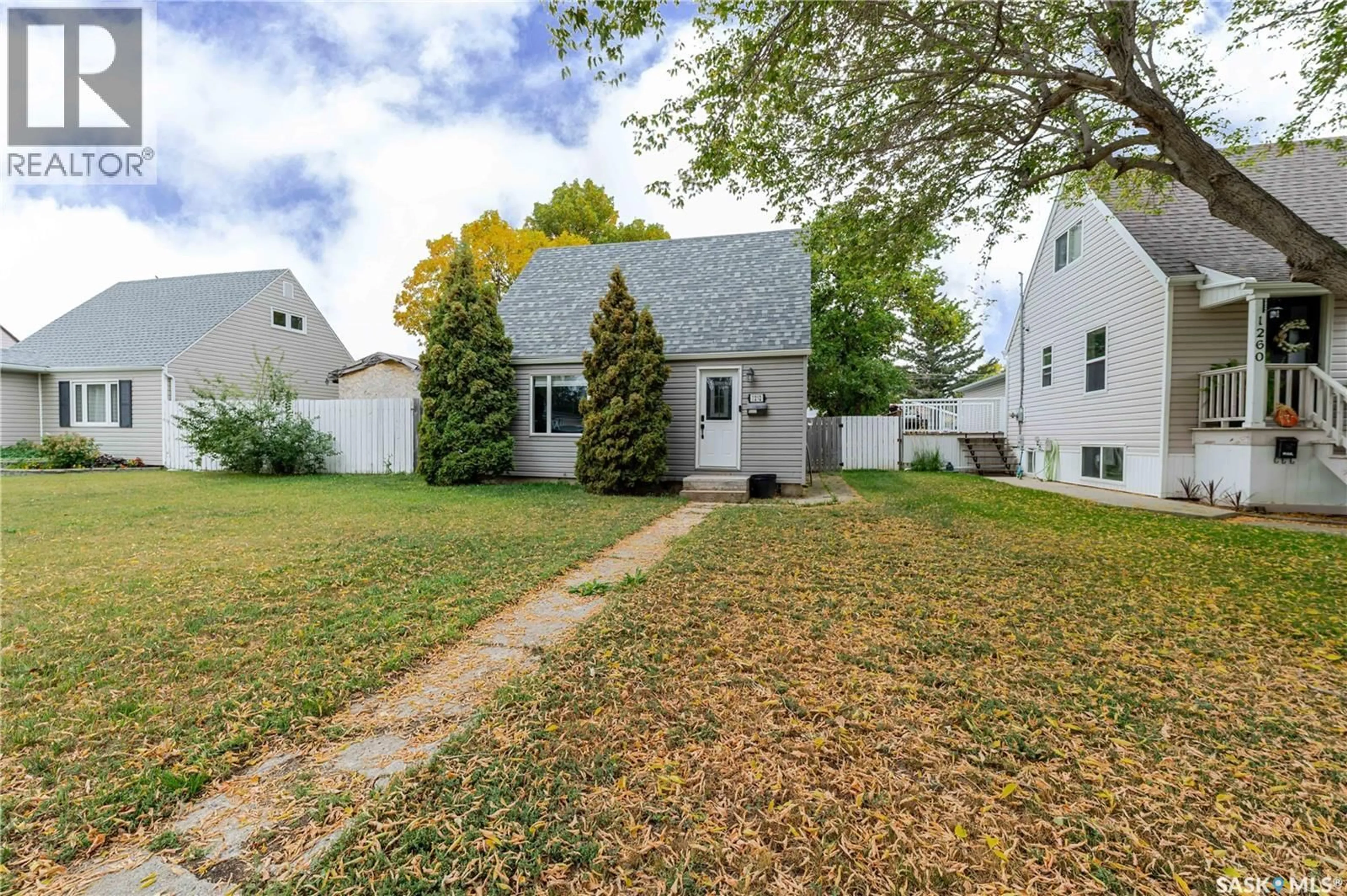 A pic from outside/outdoor area/front of a property/back of a property/a pic from drone, street for 1252 4TH AVENUE, Moose Jaw Saskatchewan S6H1J5