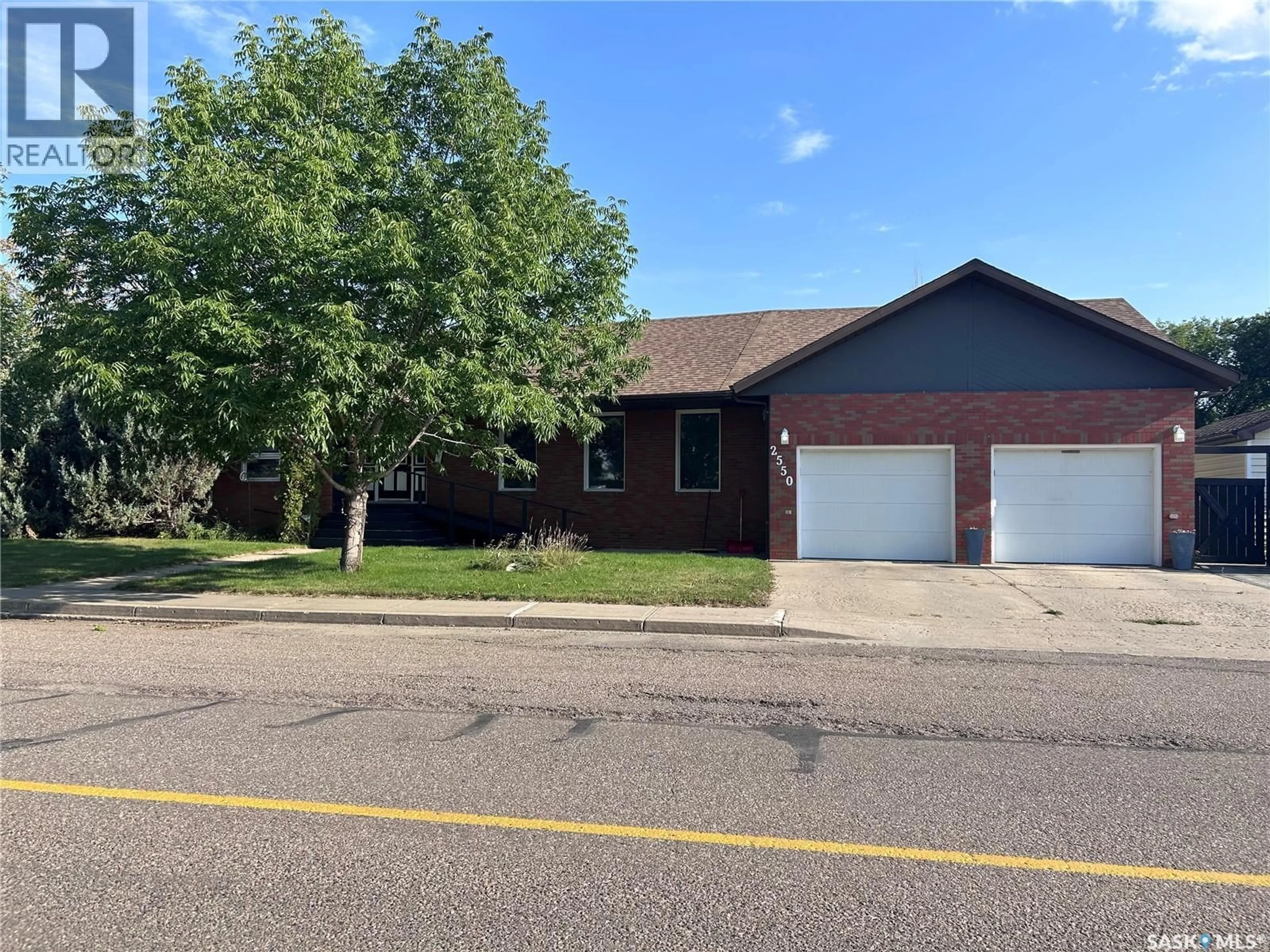 Home with brick exterior material, street for 2550 CARDINAL CRESCENT, North Battleford Saskatchewan S9A3W9