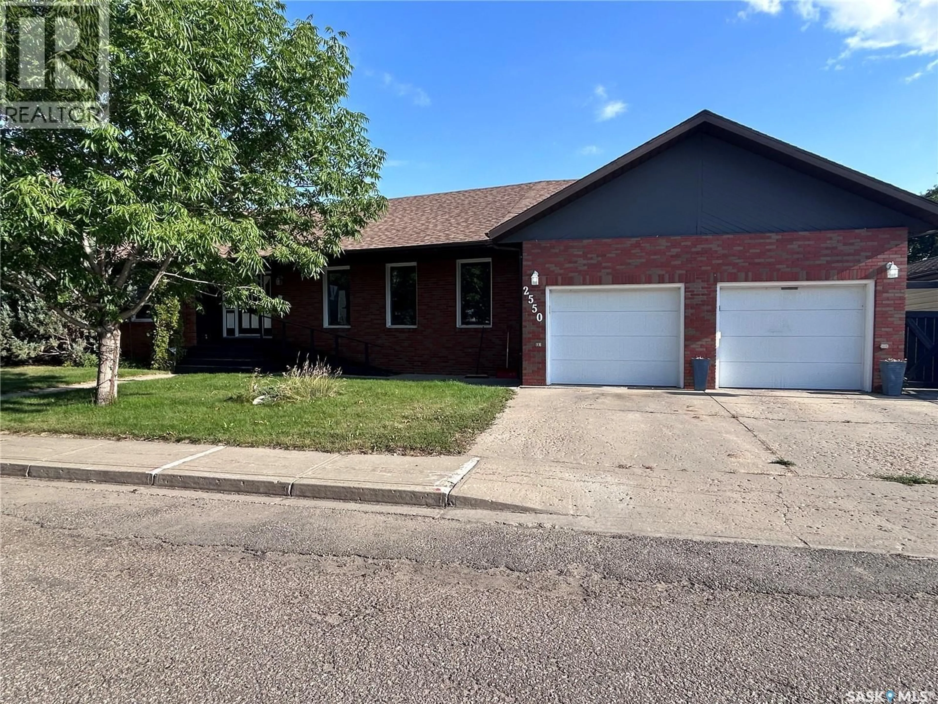 Home with brick exterior material, street for 2550 CARDINAL CRESCENT, North Battleford Saskatchewan S9A3W9
