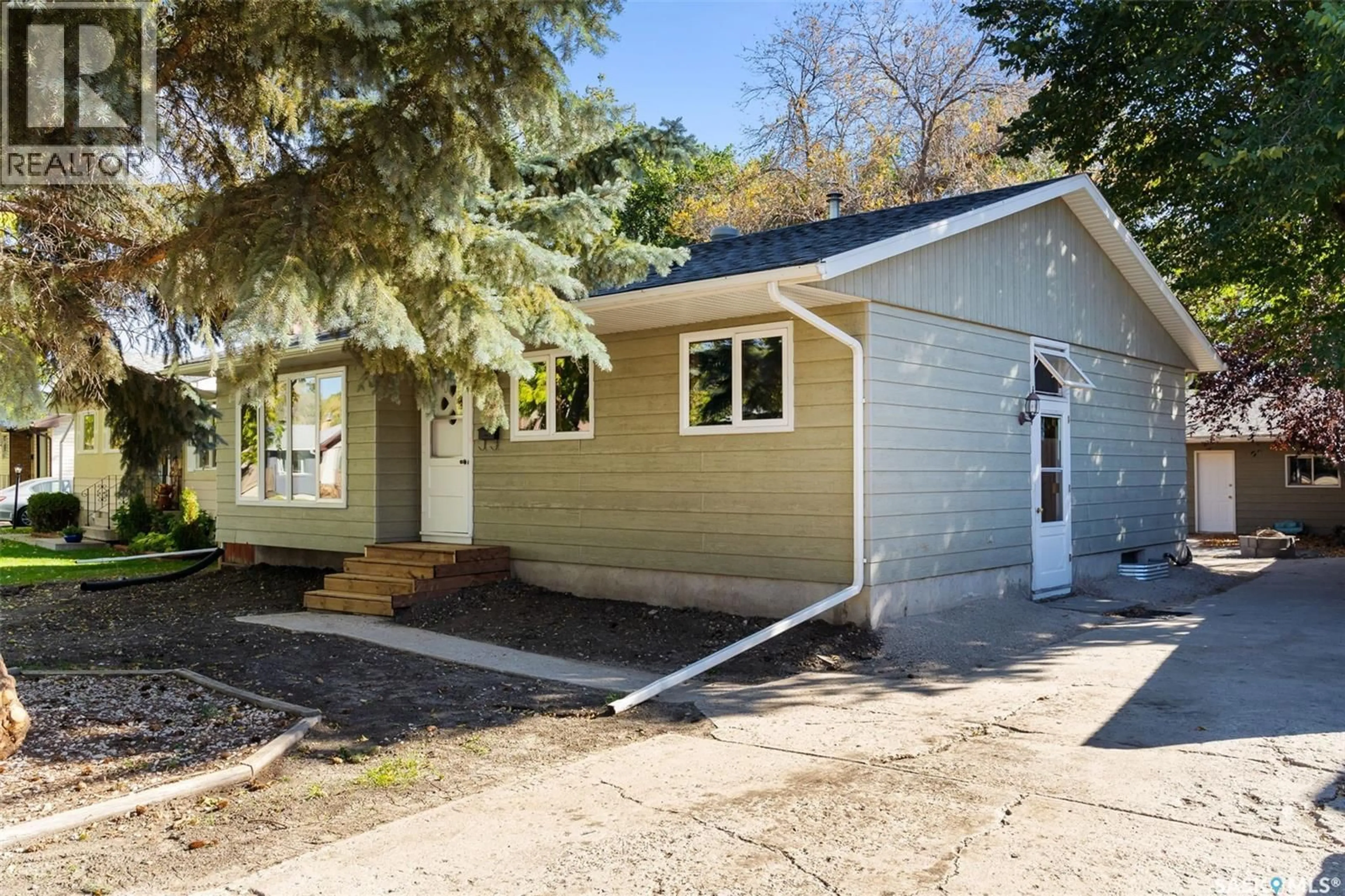Home with vinyl exterior material, street for 49 MCCORMICK CRESCENT, Regina Saskatchewan S4T6J9
