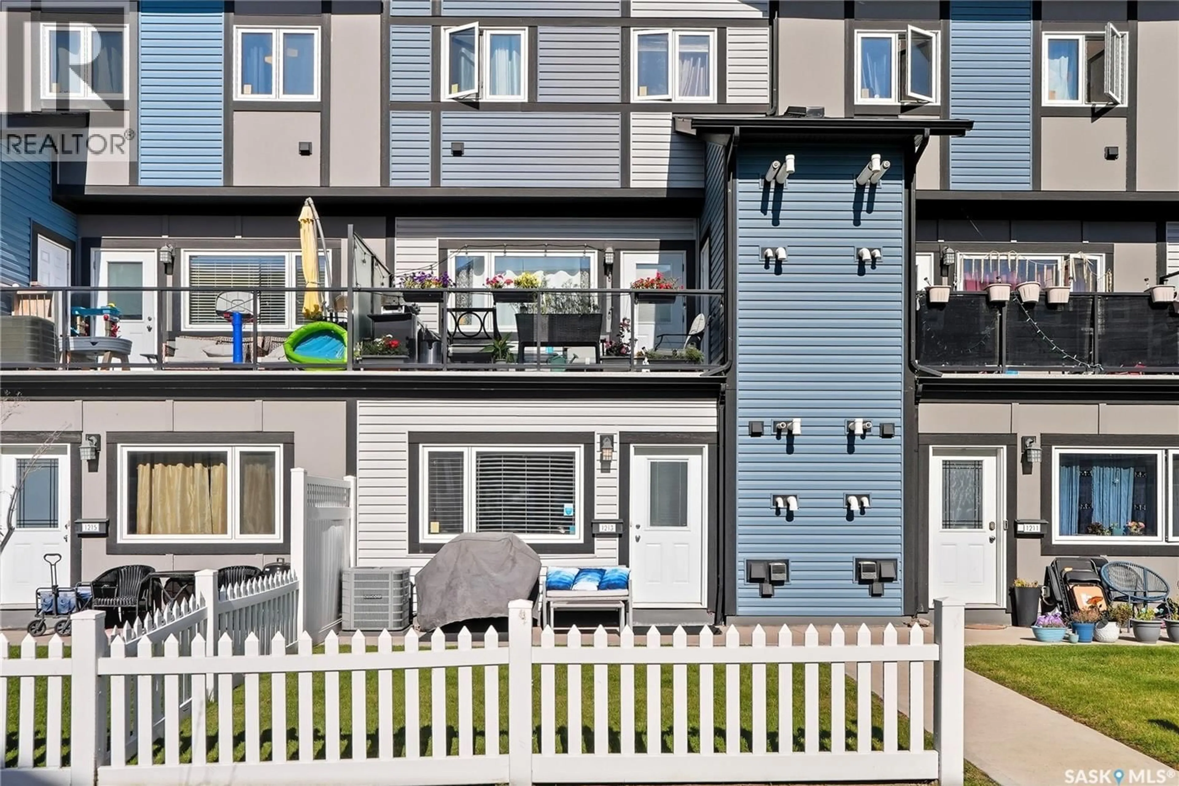 Home with vinyl exterior material, street for 1213 130 MARLATTE CRESCENT, Saskatoon Saskatchewan S7W0W1