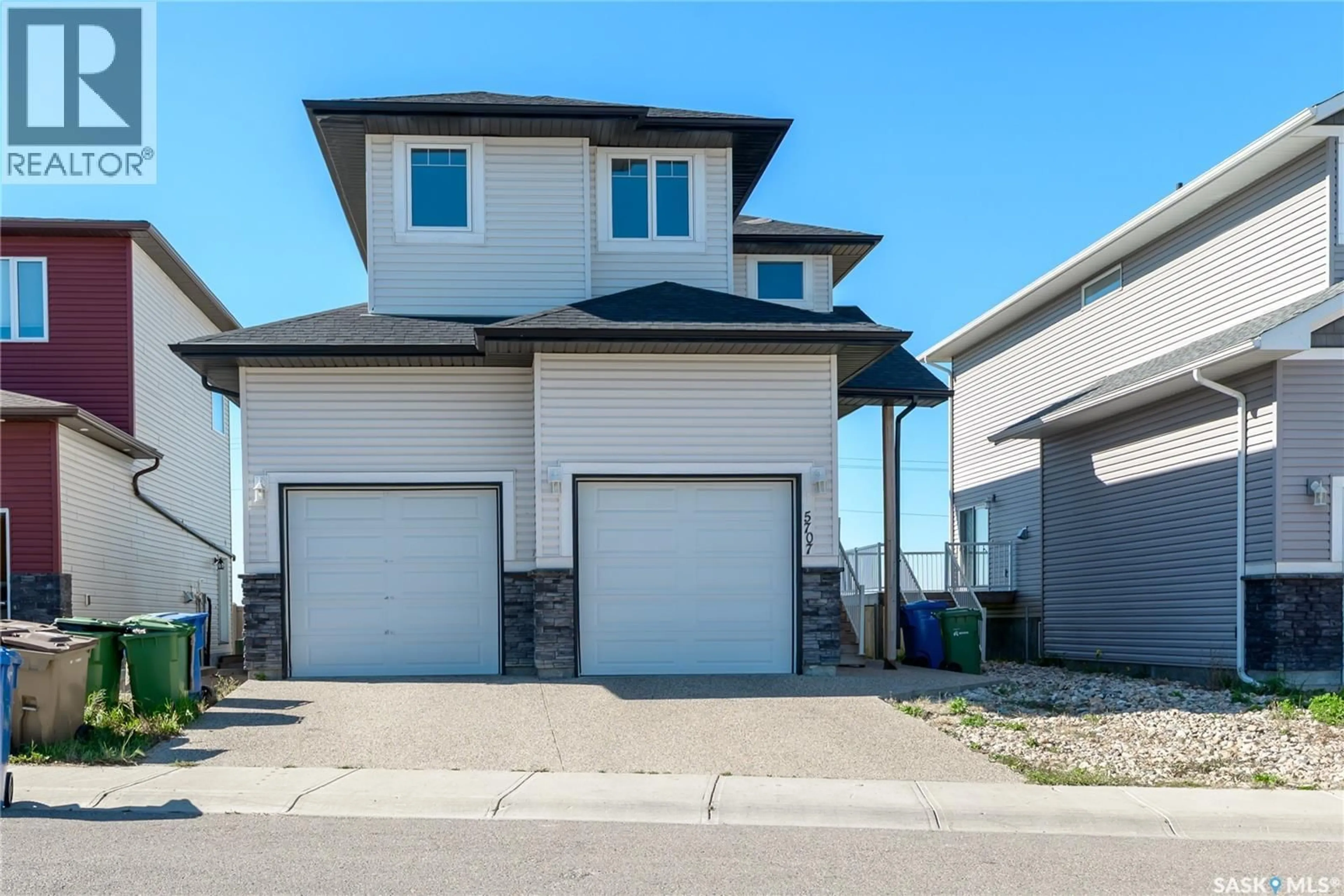 Home with vinyl exterior material, street for 5707 GLIDE CRESCENT, Regina Saskatchewan S4W0P2