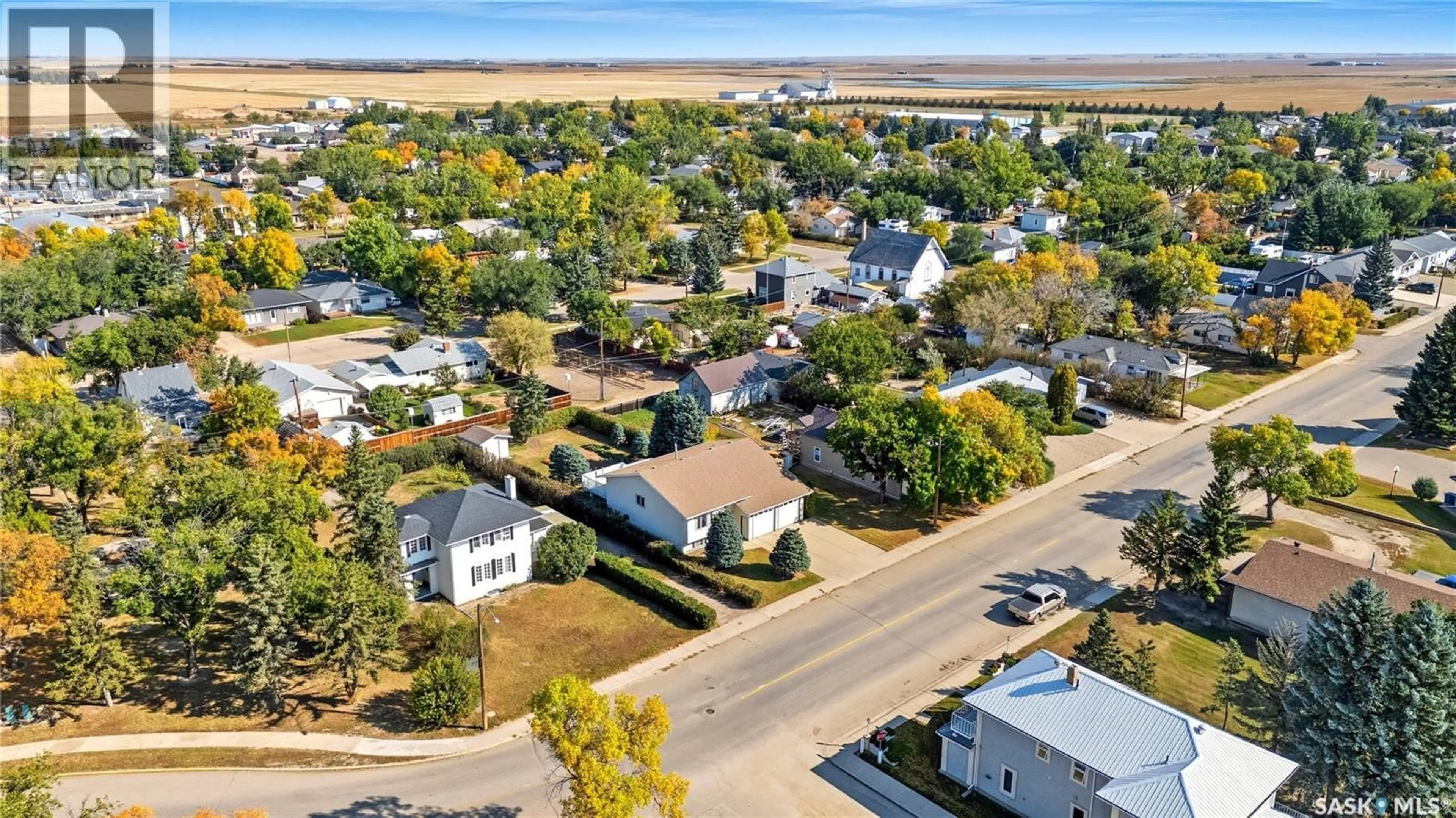 A pic from outside/outdoor area/front of a property/back of a property/a pic from drone, water/lake/river/ocean view for 109 1ST AVENUE, Gravelbourg Saskatchewan S0H1X0