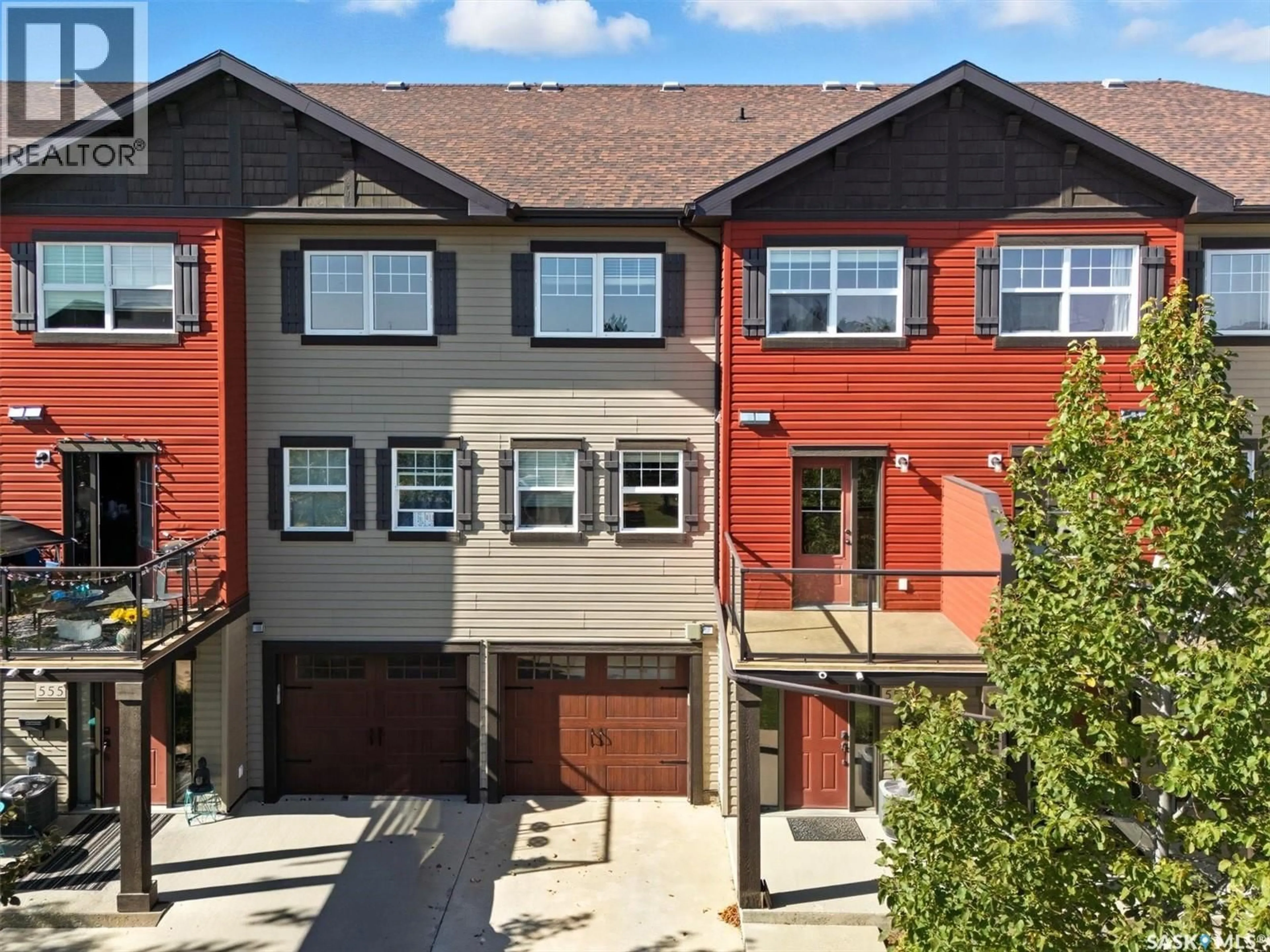 A pic from outside/outdoor area/front of a property/back of a property/a pic from drone, street for 150 - 553 LANGLOIS WAY, Saskatoon Saskatchewan S7T0L2