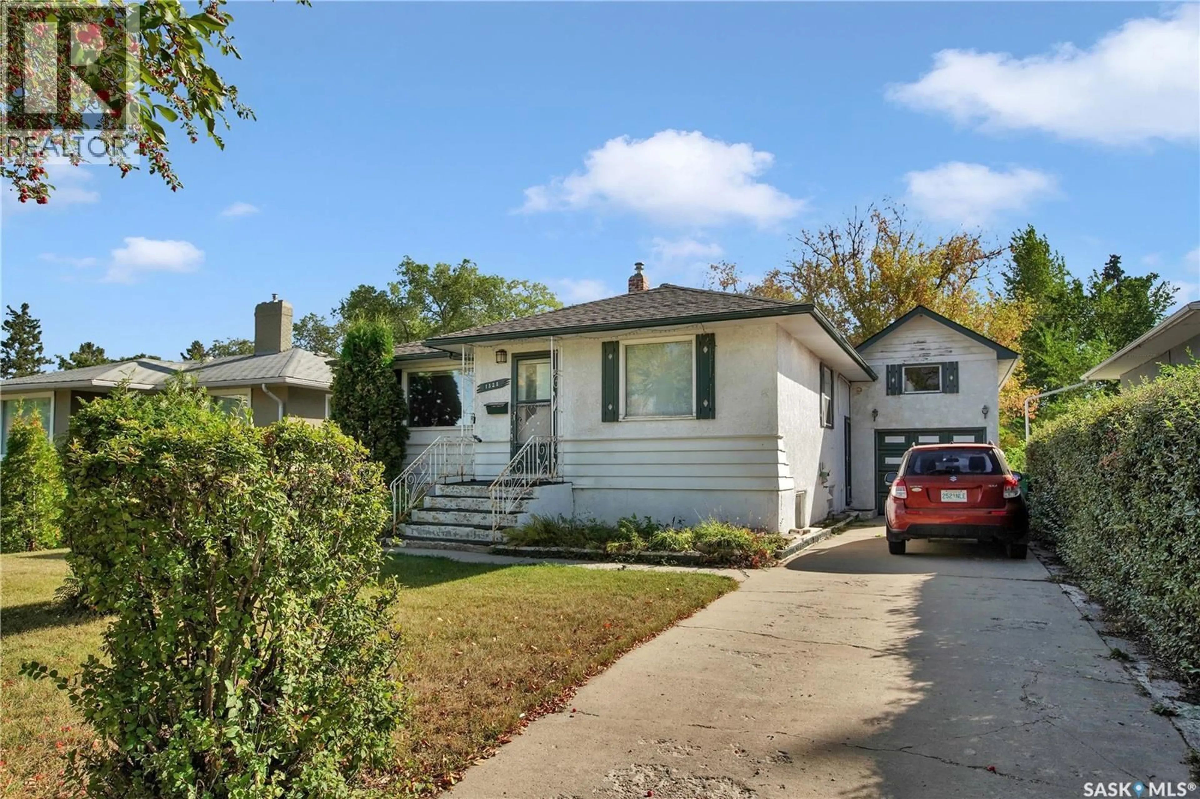 Home with vinyl exterior material, street for 1328 MAIN STREET, Saskatoon Saskatchewan S7H0L4