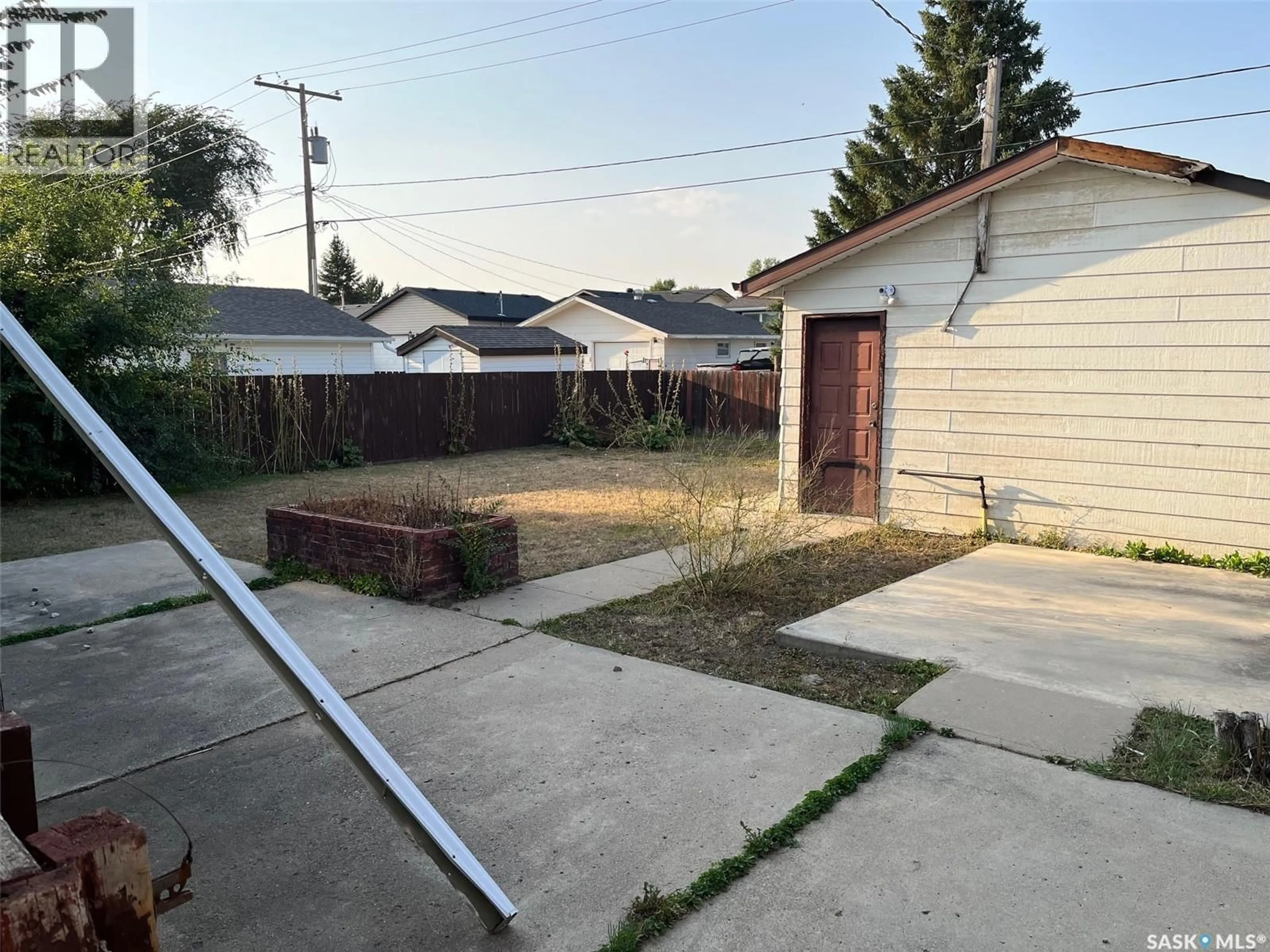 A pic from outside/outdoor area/front of a property/back of a property/a pic from drone, street for 1530 GLENDALE STREET, Moose Jaw Saskatchewan S6H7A1