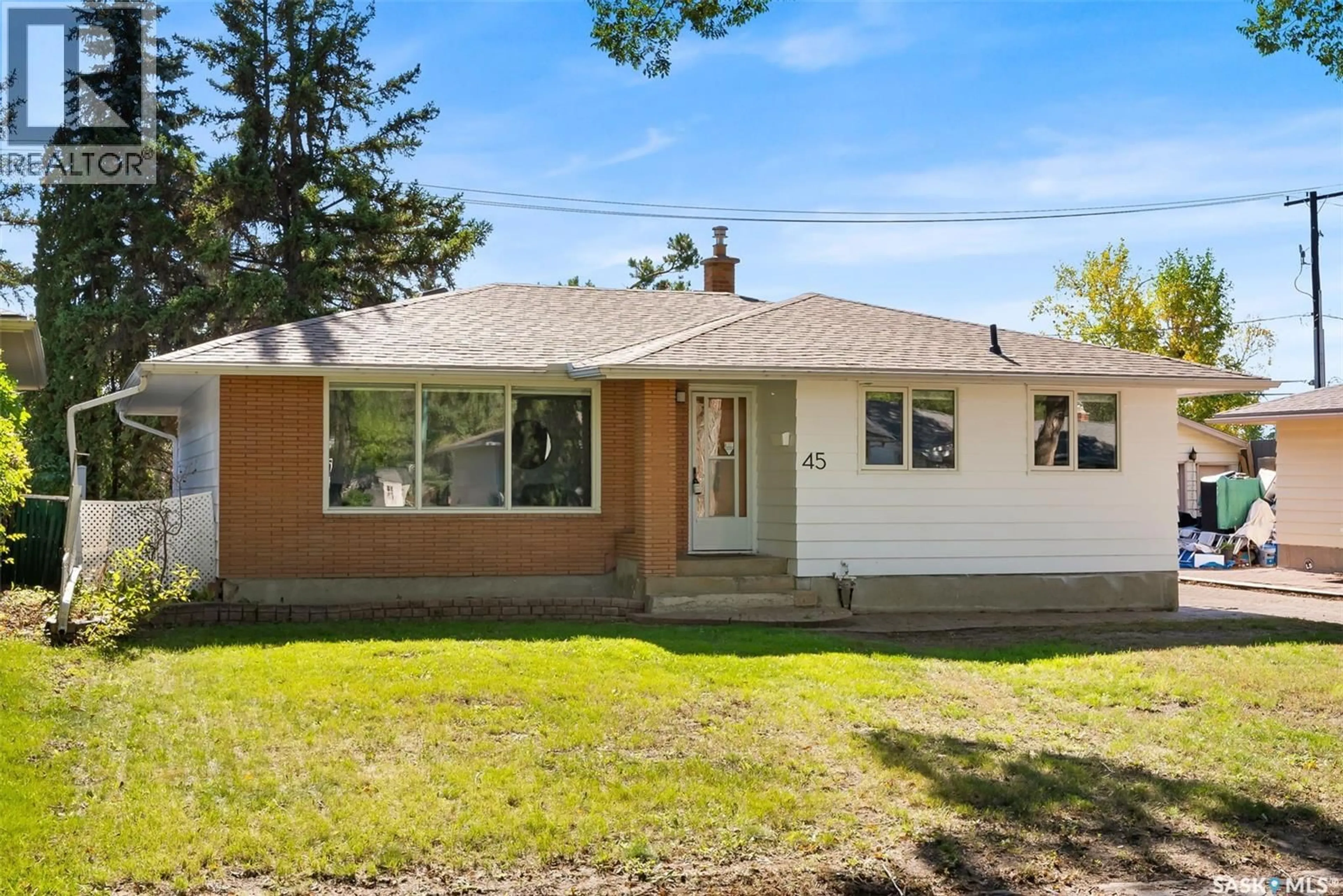 Home with vinyl exterior material, street for 45 DARKE CRESCENT, Regina Saskatchewan S4S2W5