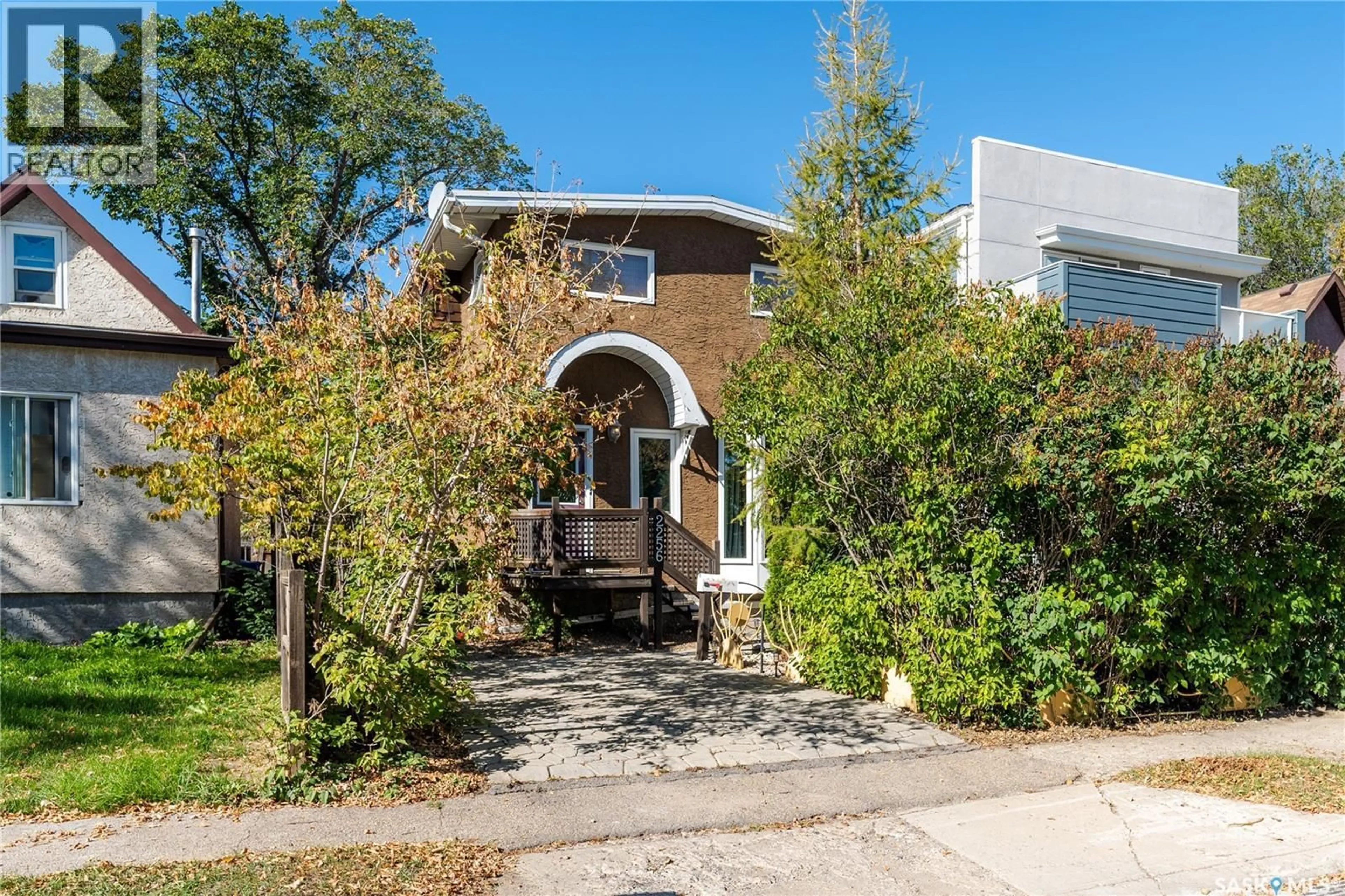Home with brick exterior material, street for 2256 PASQUA STREET, Regina Saskatchewan S4T4M4