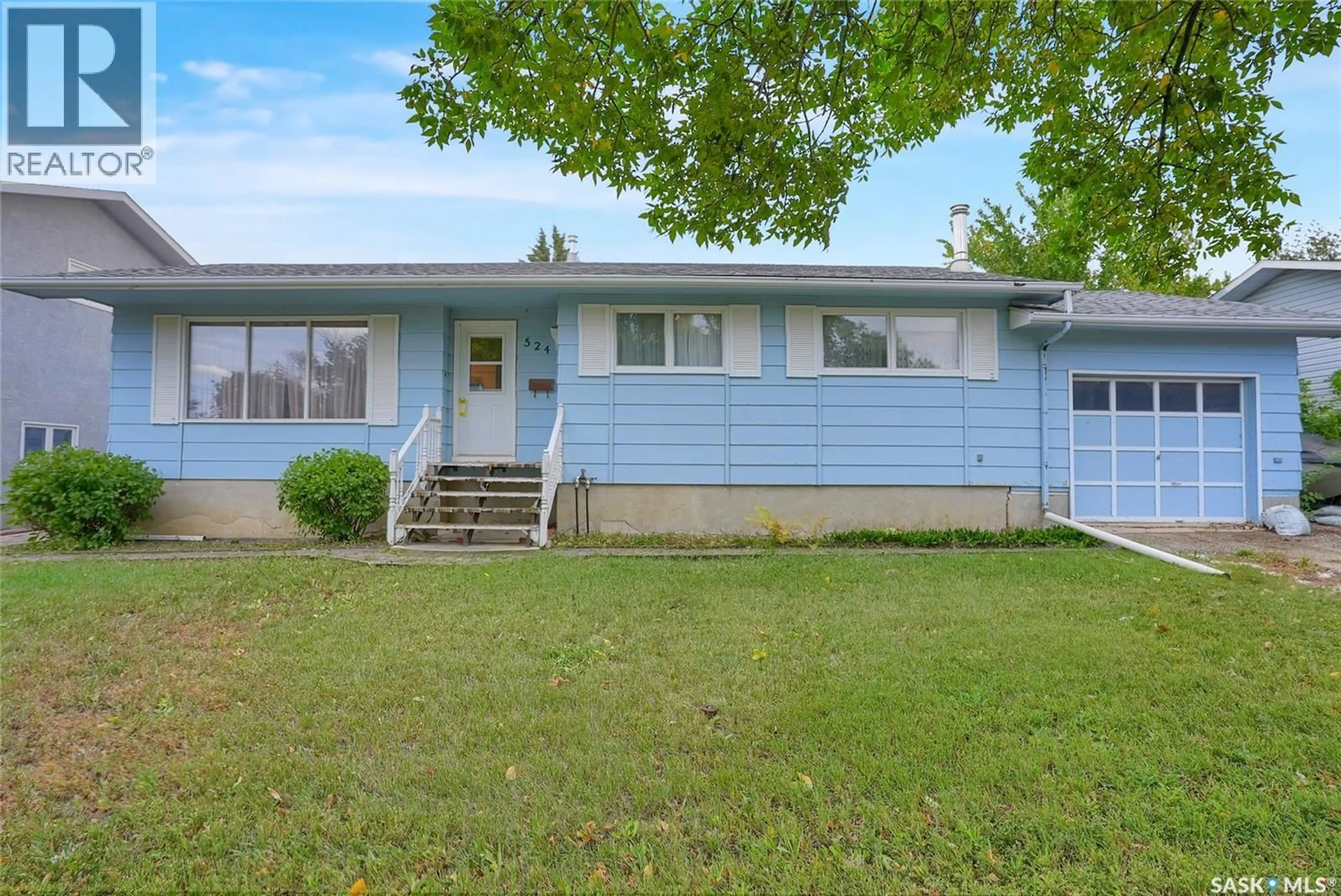 Home with vinyl exterior material, street for 524 6TH AVENUE, Assiniboia Saskatchewan S0H0B0