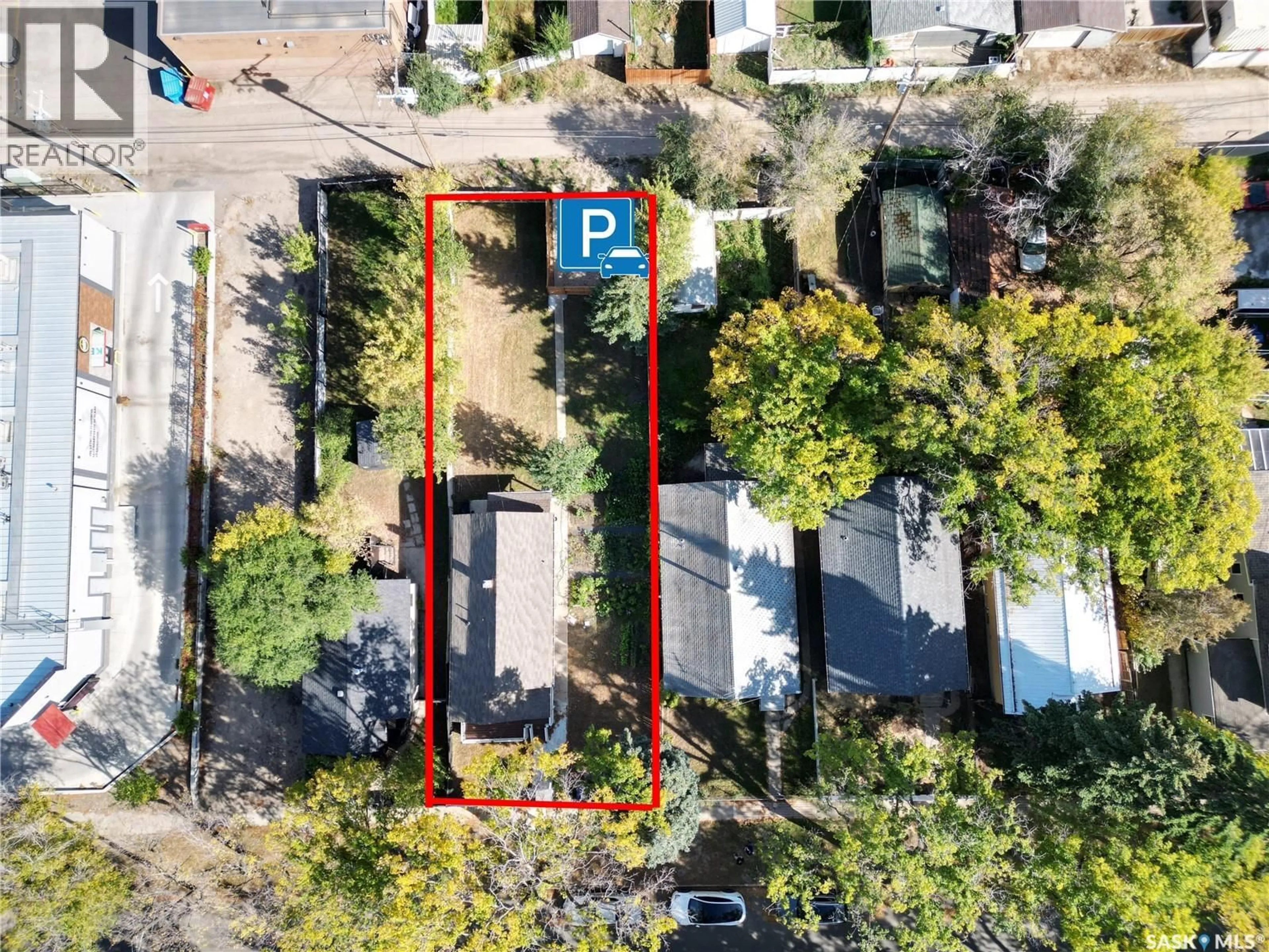 A pic from outside/outdoor area/front of a property/back of a property/a pic from drone, street for 114 E AVENUE S, Saskatoon Saskatchewan S7M1R6