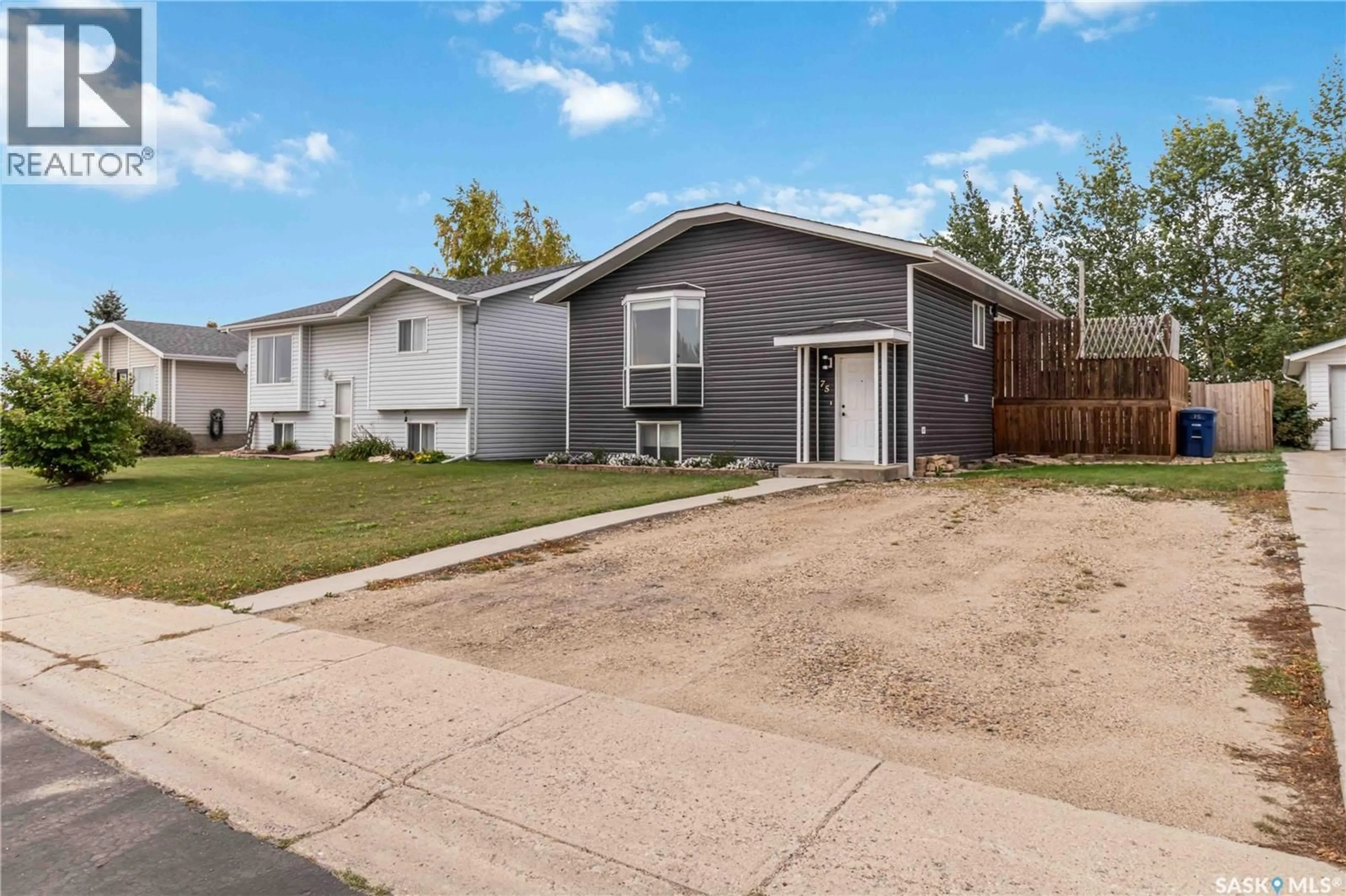Home with vinyl exterior material, street for 75 3RD STREET, Humboldt Saskatchewan S0K2A0