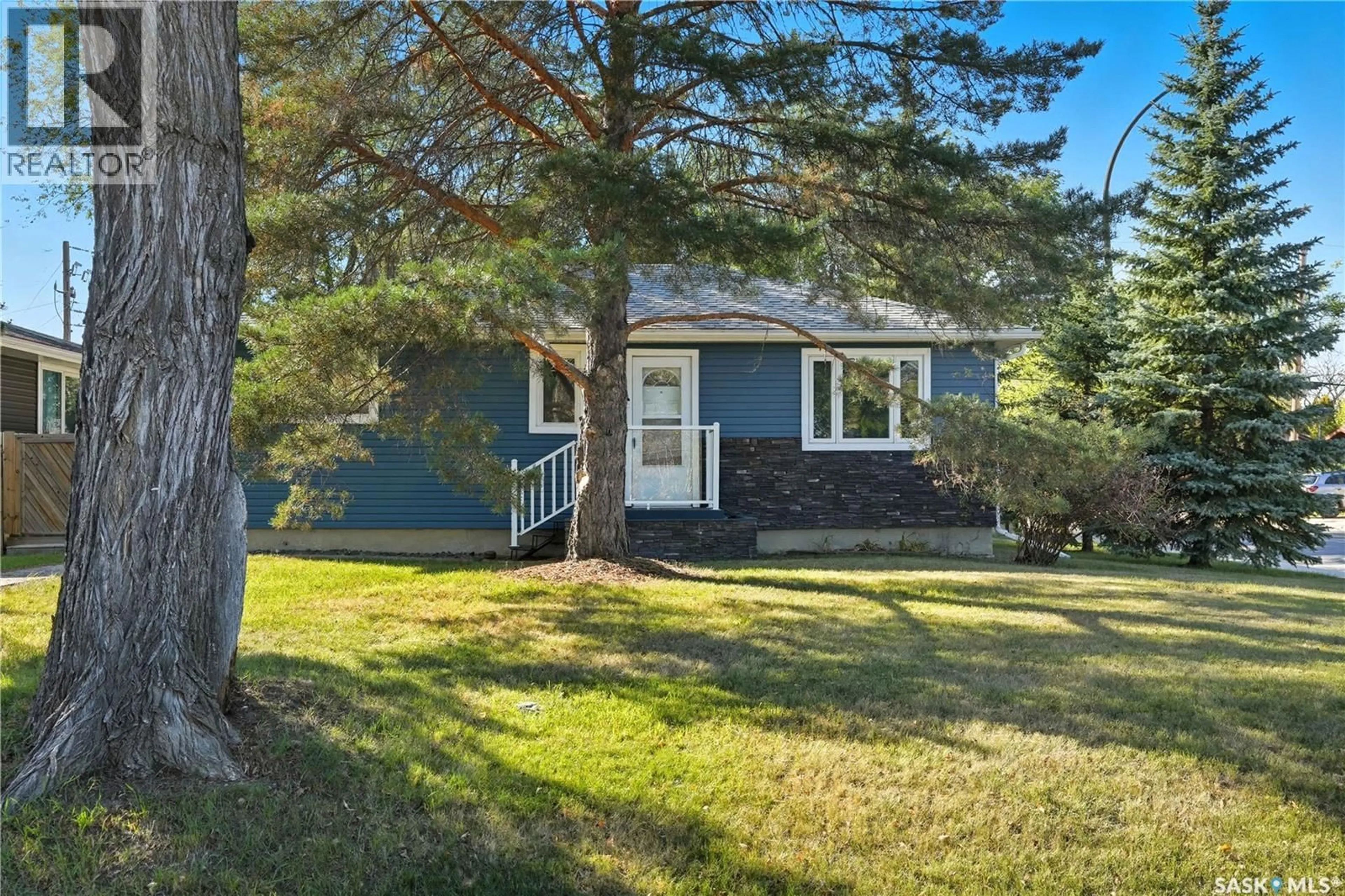 Home with vinyl exterior material, street for 700 CONNAUGHT STREET, Regina Saskatchewan S4T4V3