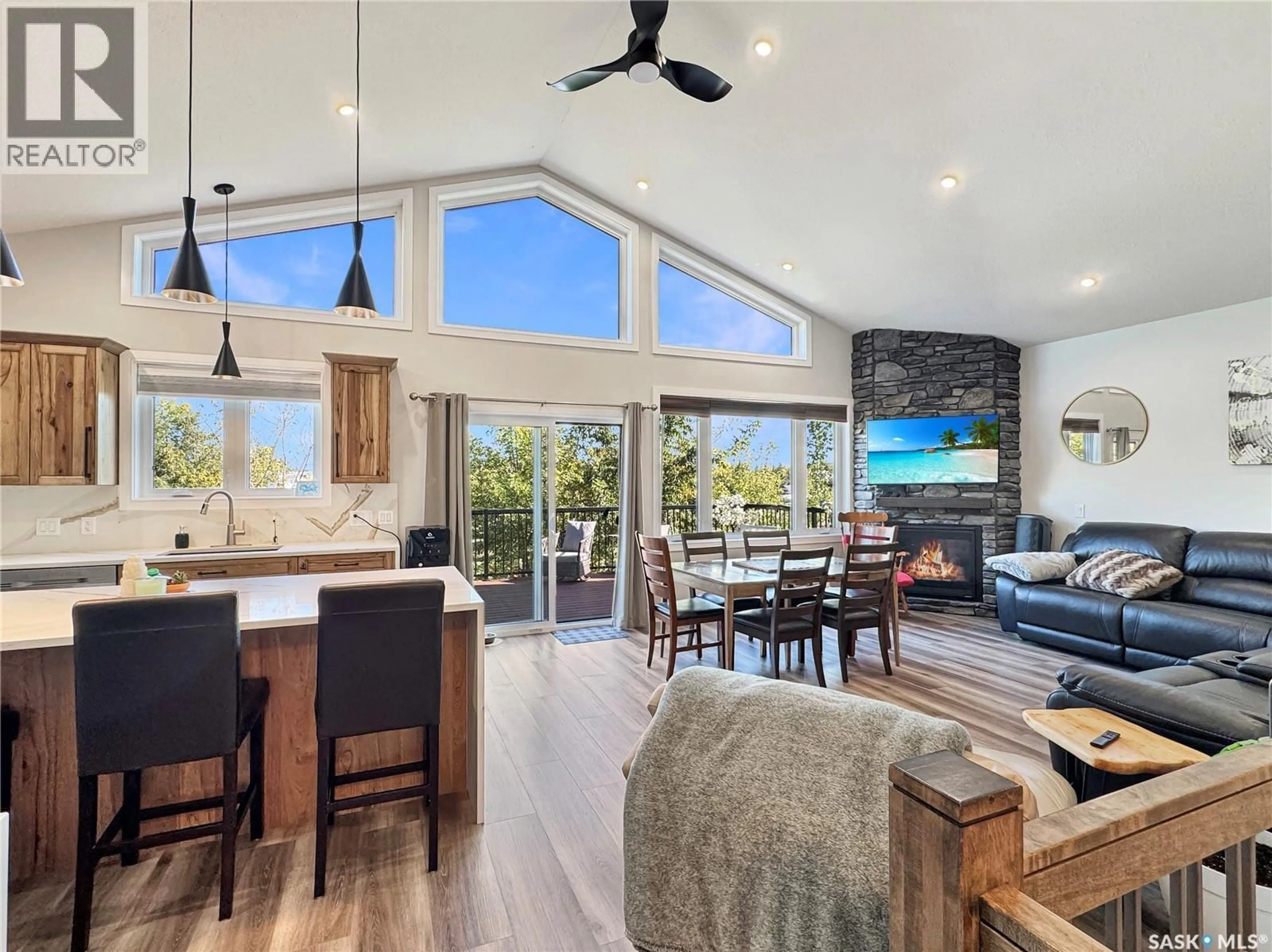Open concept kitchen, wood/laminate floor for 403-404 PARK PLACE, Iroquois Lake Saskatchewan S0J2G0