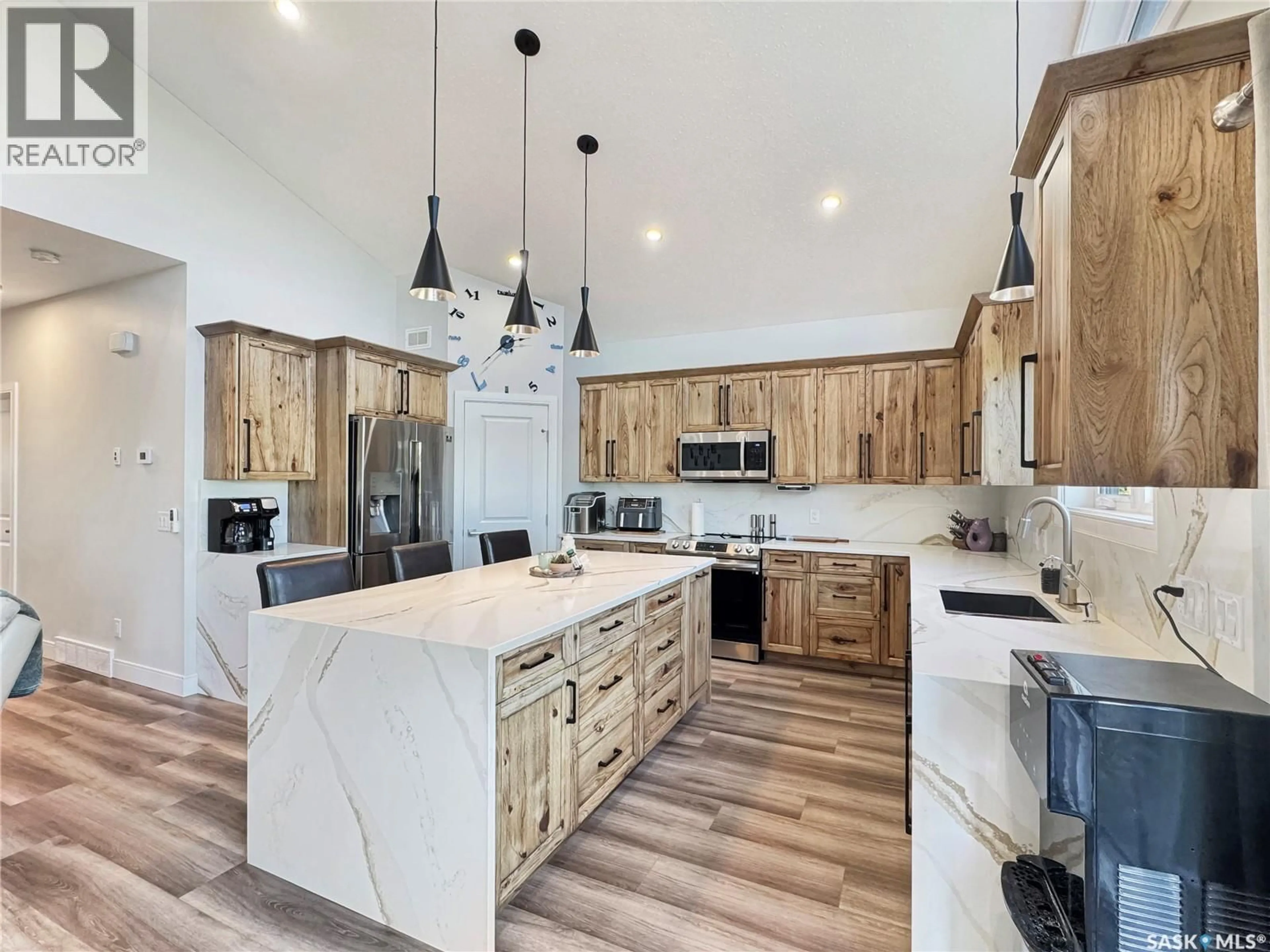 Open concept kitchen, unknown for 403-404 PARK PLACE, Iroquois Lake Saskatchewan S0J2G0