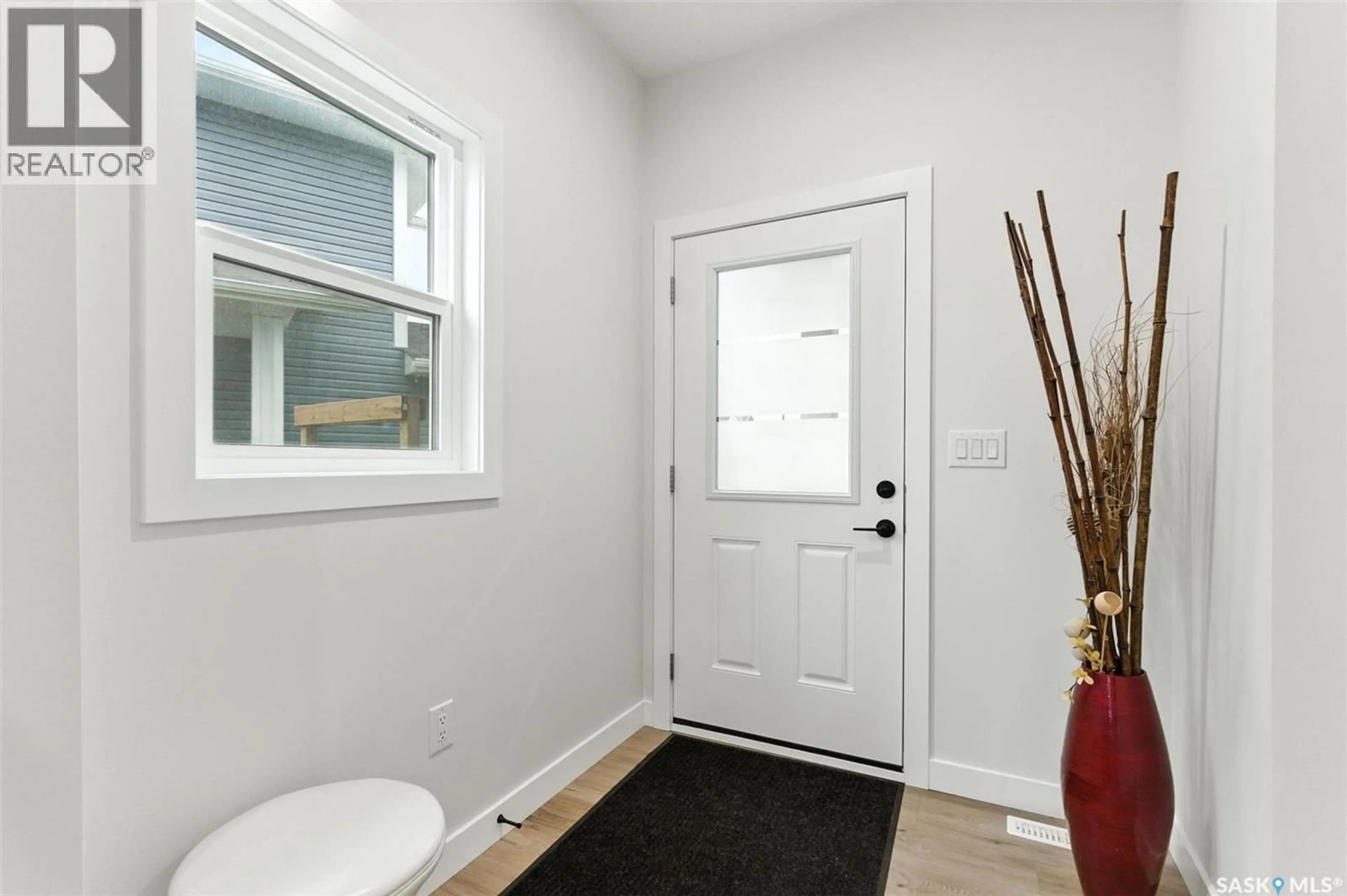 Indoor entryway for 227 PRASAD MANOR, Saskatoon Saskatchewan S7V1L4