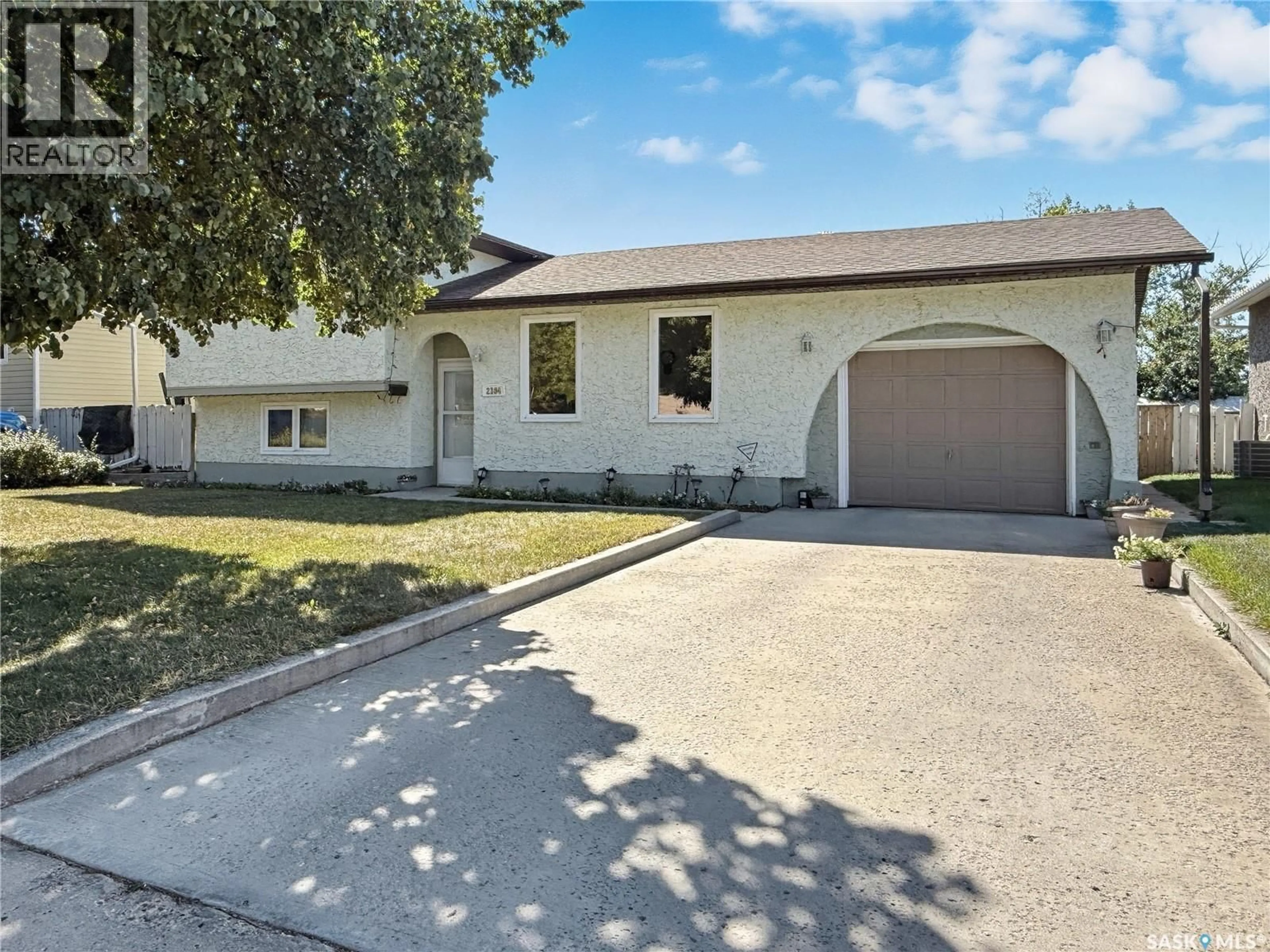 Home with vinyl exterior material, street for 2184 DOUGLAS AVENUE, North Battleford Saskatchewan S9A3A9