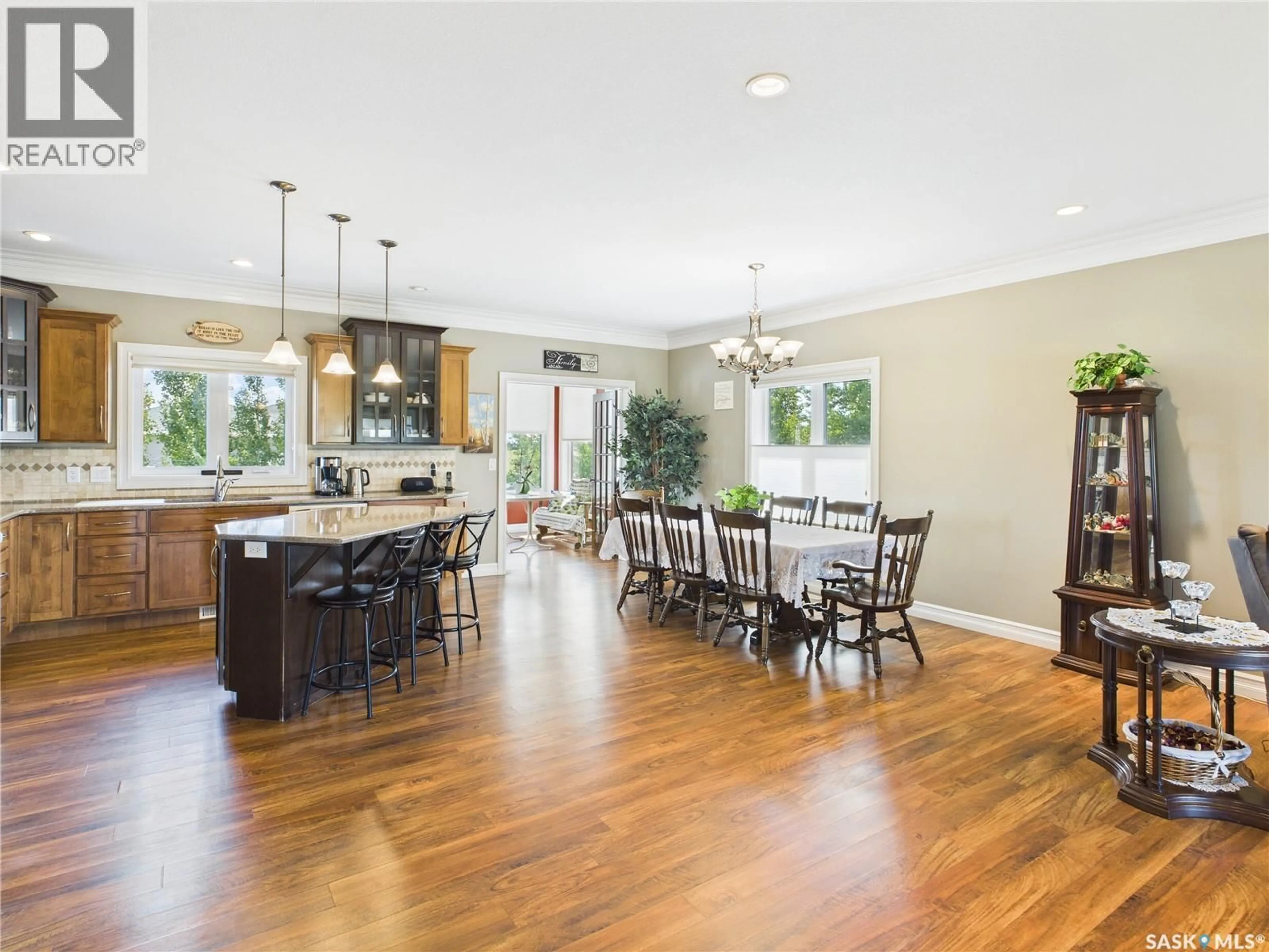 Open concept kitchen, wood/laminate floor for 100 2ND STREET, Birch Hills Saskatchewan S0J0G0
