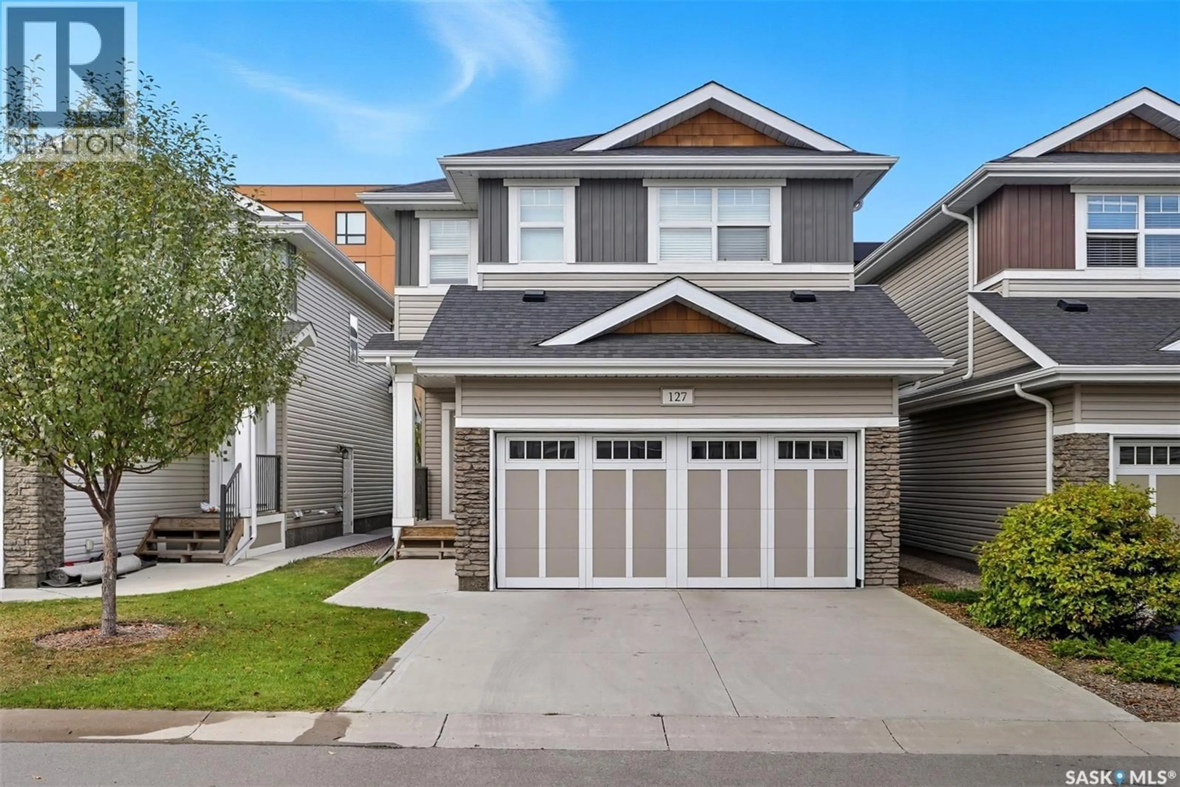 Home with vinyl exterior material, street for 315 - 127 DICKSON CRESCENT, Saskatoon Saskatchewan S7T0Z1
