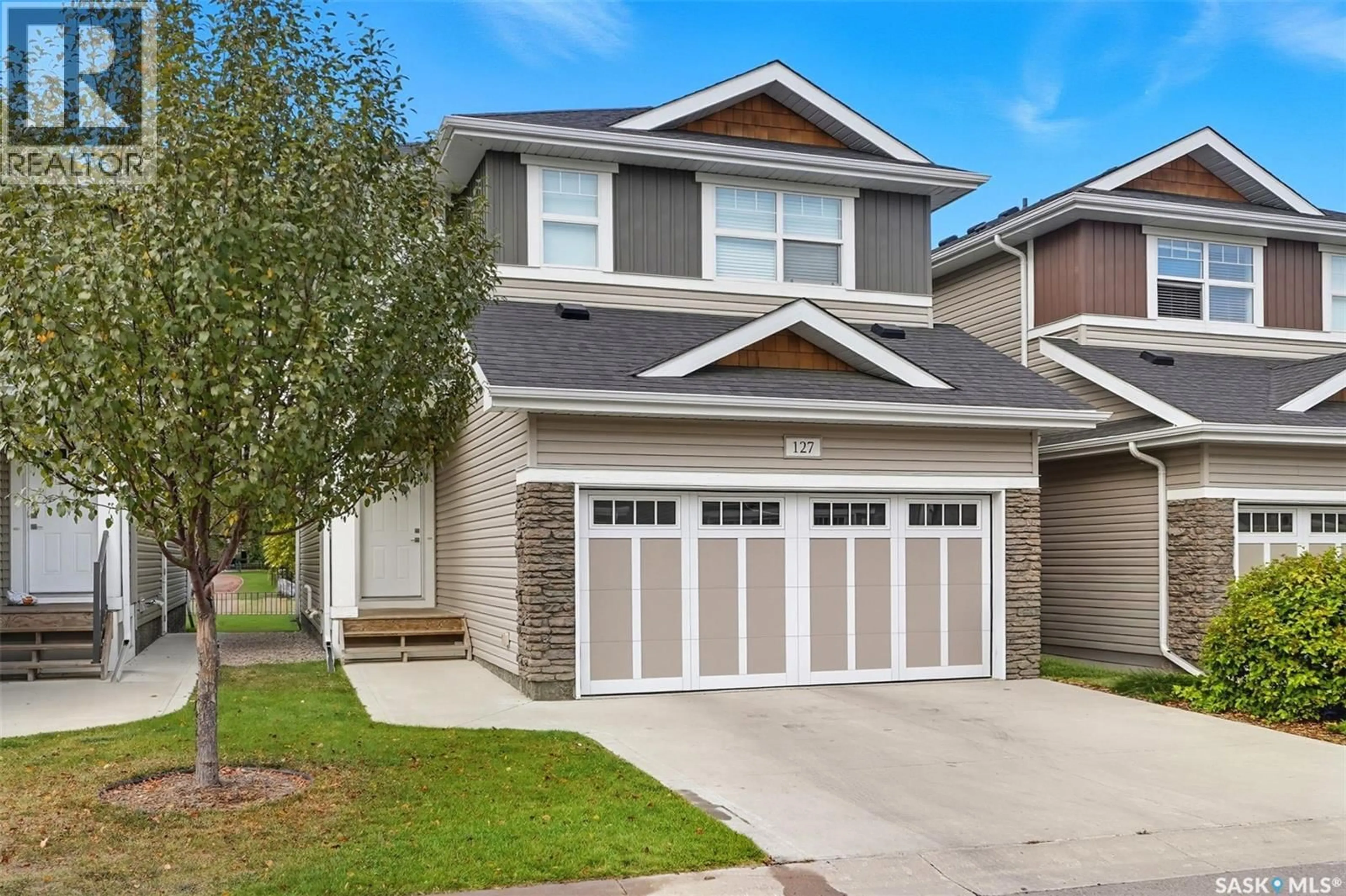 Home with vinyl exterior material, street for 315 - 127 DICKSON CRESCENT, Saskatoon Saskatchewan S7T0Z1