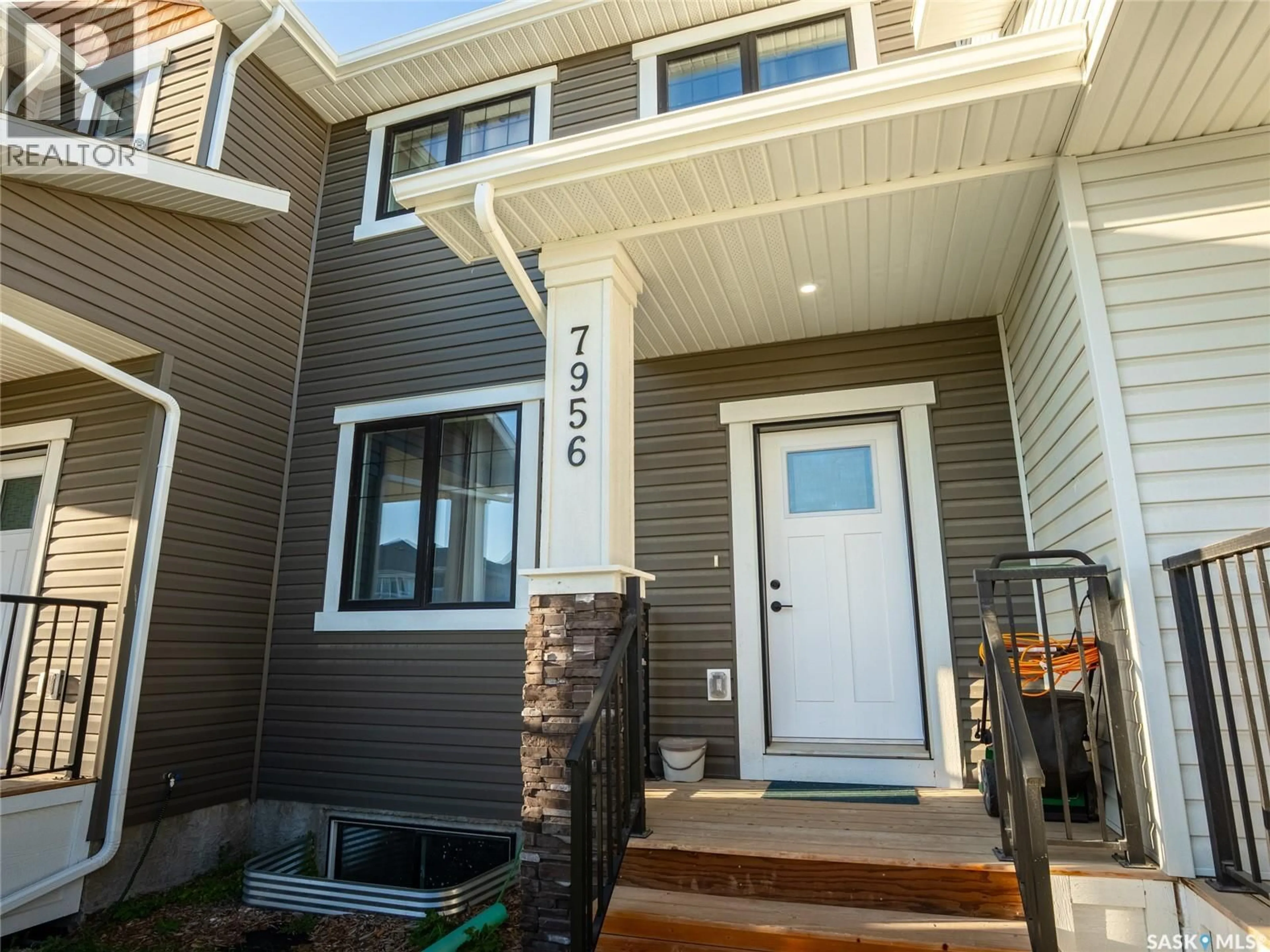 Home with vinyl exterior material, street for 7956 LENTIL AVENUE, Regina Saskatchewan S4Y0E9