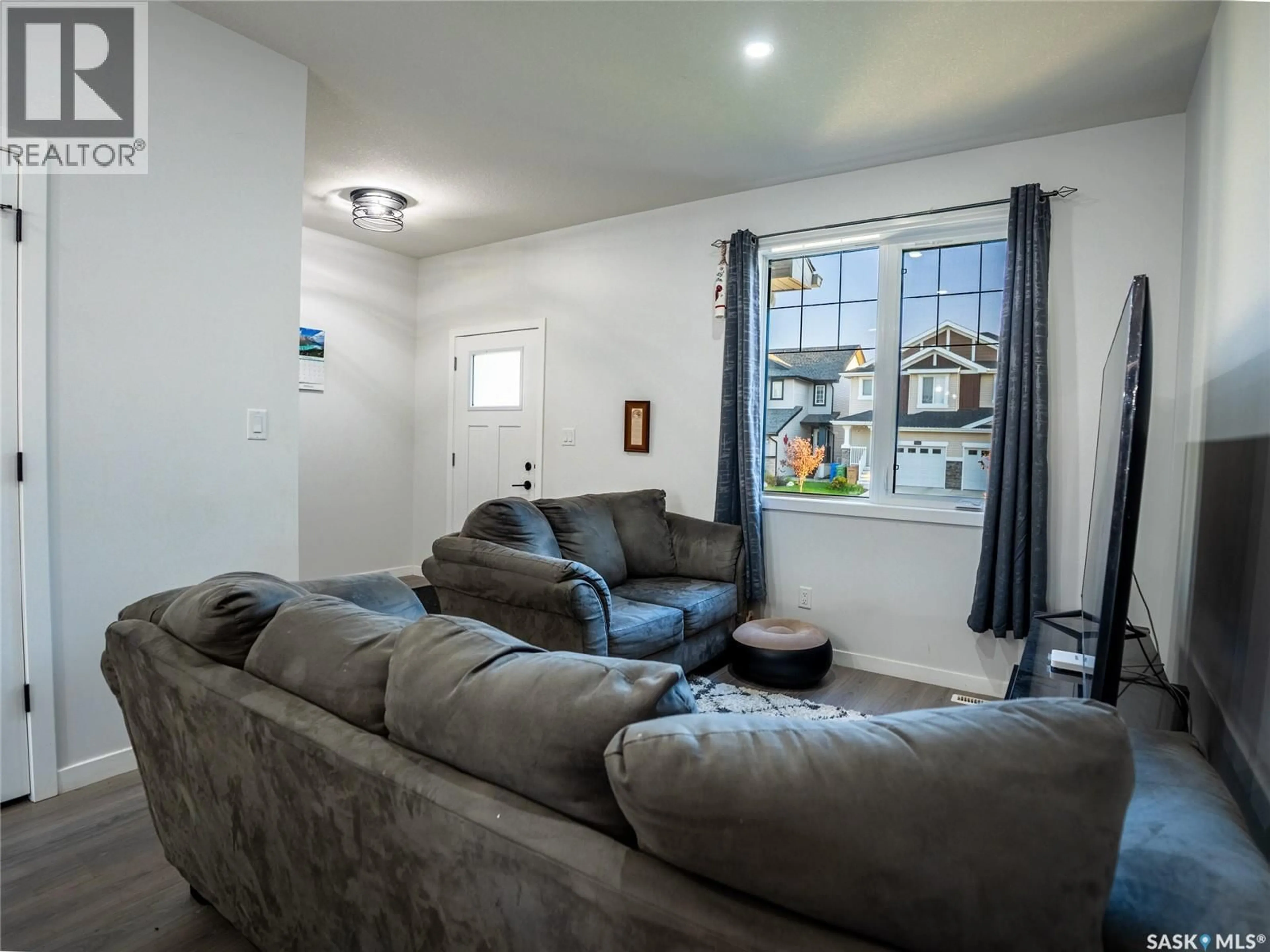 Living room with furniture, unknown for 7956 LENTIL AVENUE, Regina Saskatchewan S4Y0E9