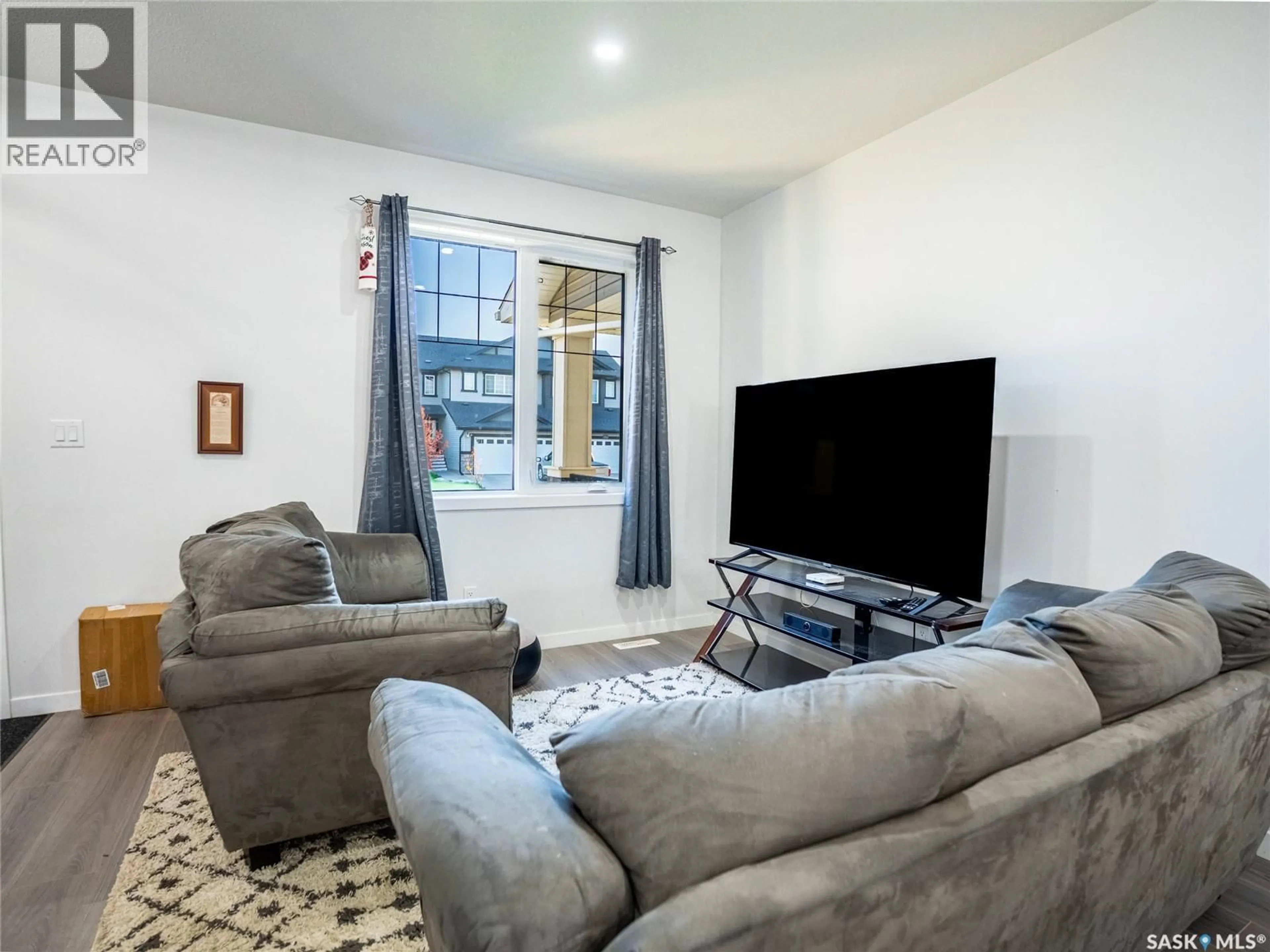 Living room with furniture, unknown for 7956 LENTIL AVENUE, Regina Saskatchewan S4Y0E9