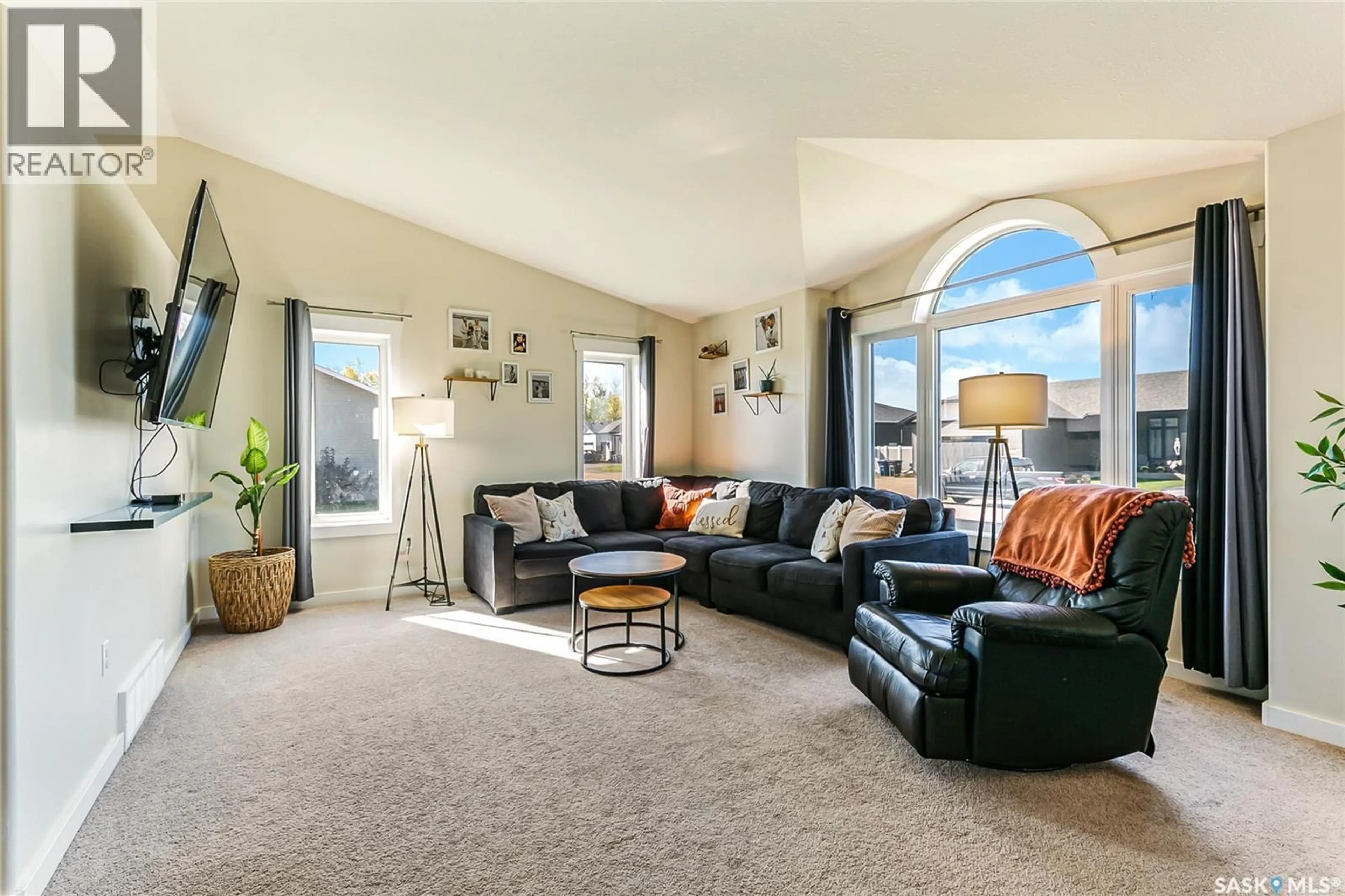 Living room with furniture, carpet floor for 209 CARTER STREET, Mclean Saskatchewan S0G3E0