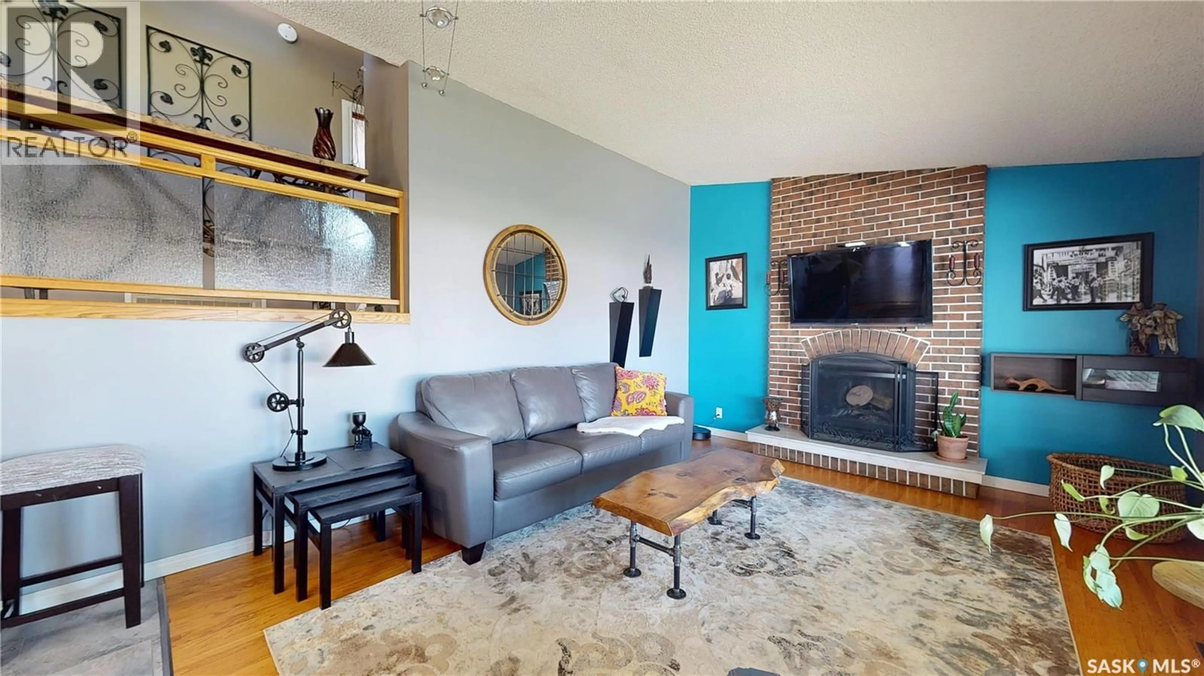 Living room with furniture, unknown for 102 MCINNIS CRESCENT, Regina Saskatchewan S4R3E8