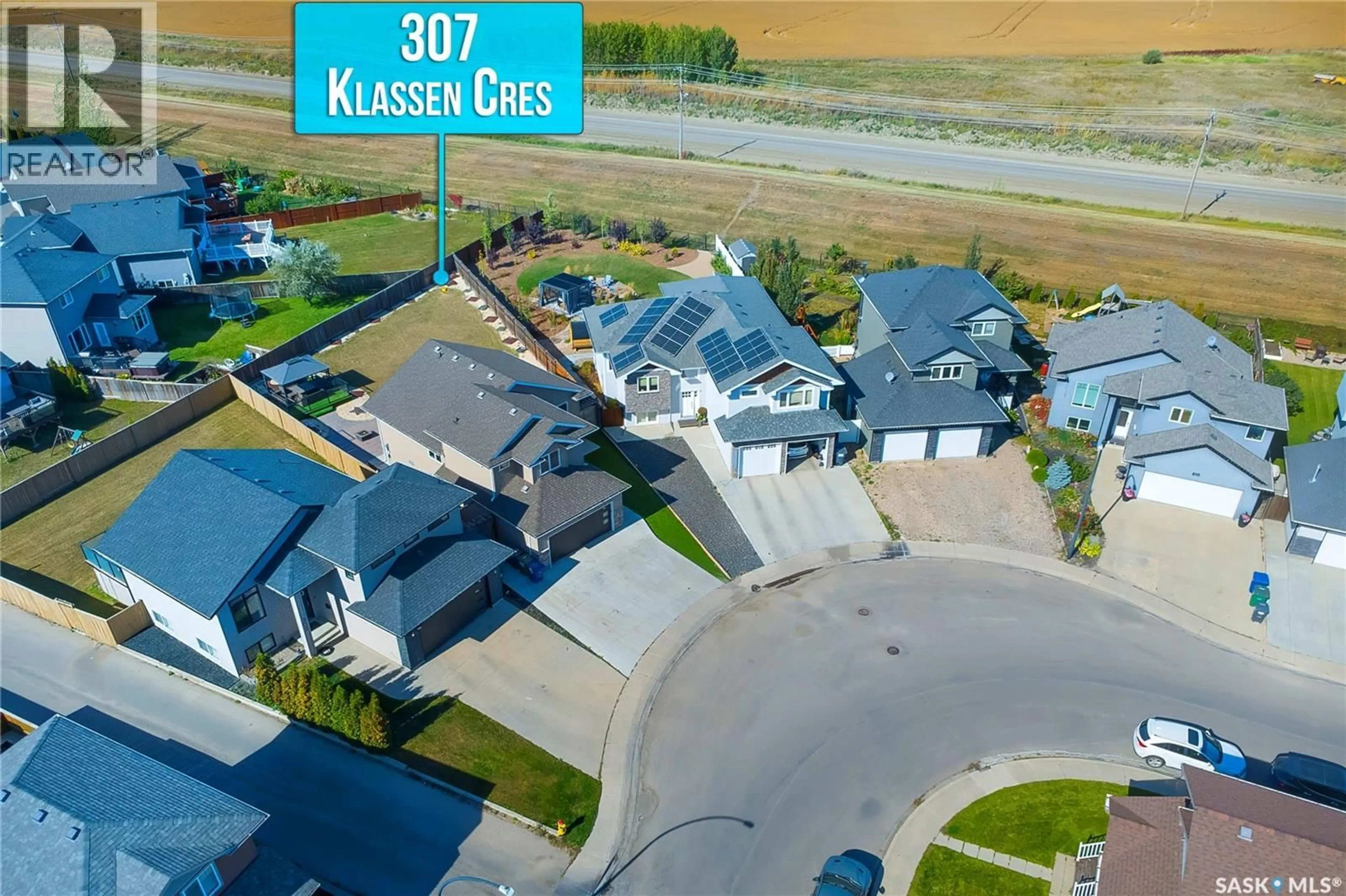 A pic from outside/outdoor area/front of a property/back of a property/a pic from drone, street for 307 KLASSEN CRESCENT, Saskatoon Saskatchewan S7R0E9