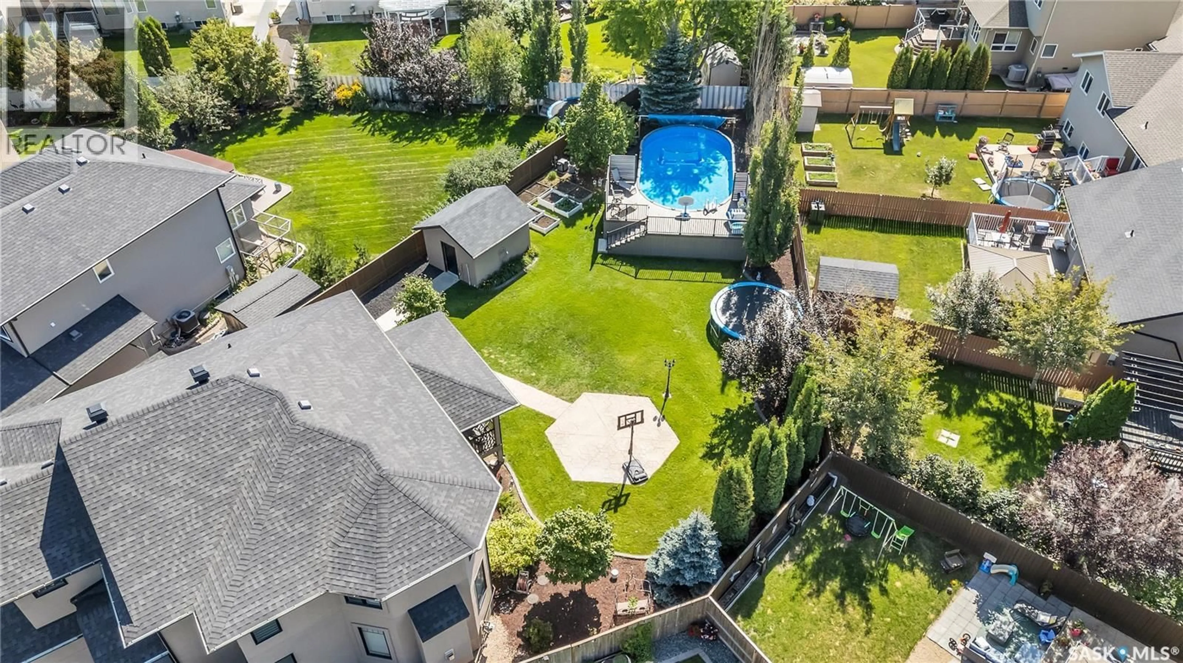 A pic from outside/outdoor area/front of a property/back of a property/a pic from drone, water/lake/river/ocean view for 130 SKUCE PLACE, Saskatoon Saskatchewan S7M0G8