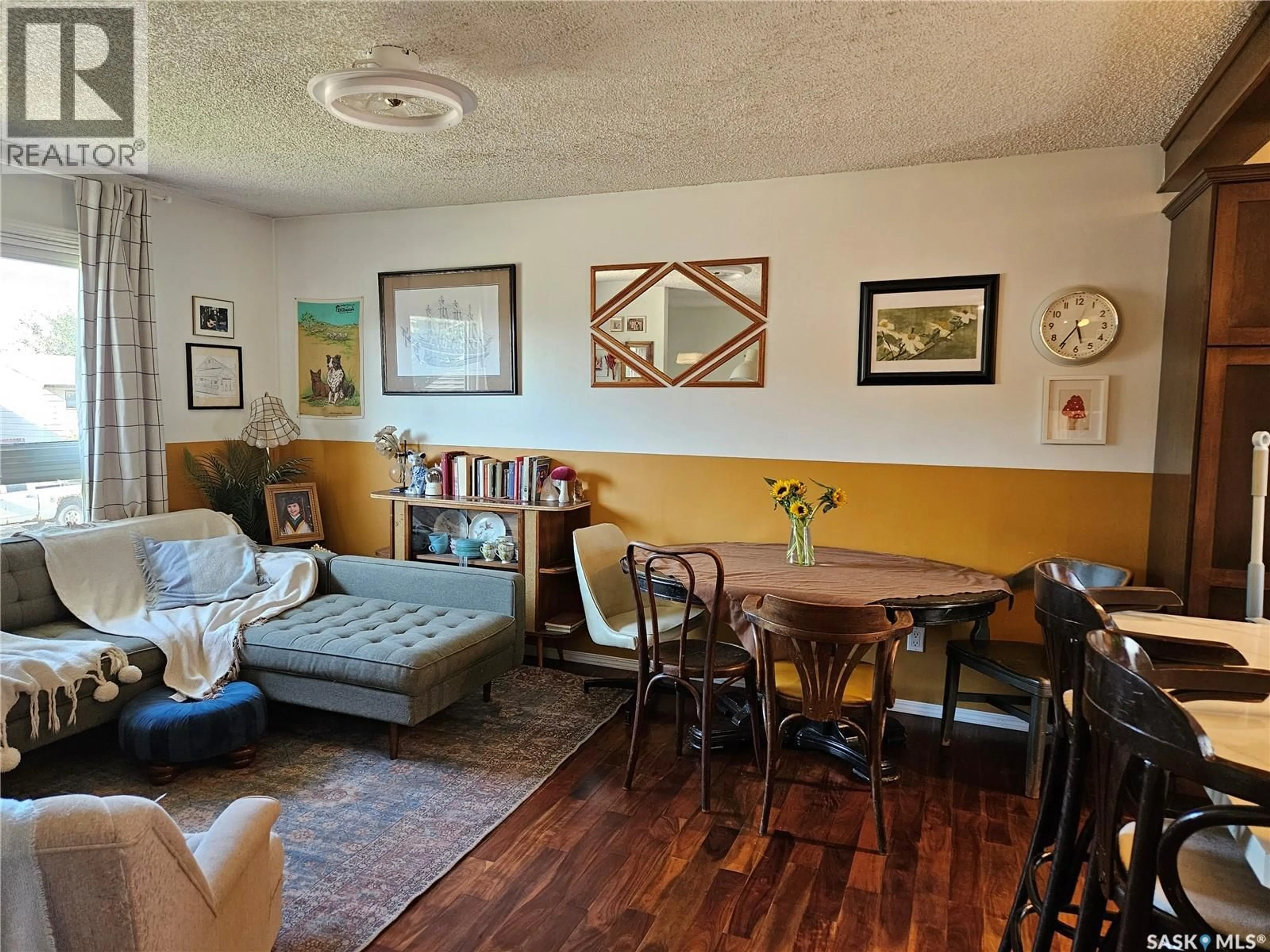 Living room with furniture, wood/laminate floor for 1519 GRANDVIEW STREET, Moose Jaw Saskatchewan S6H6R4