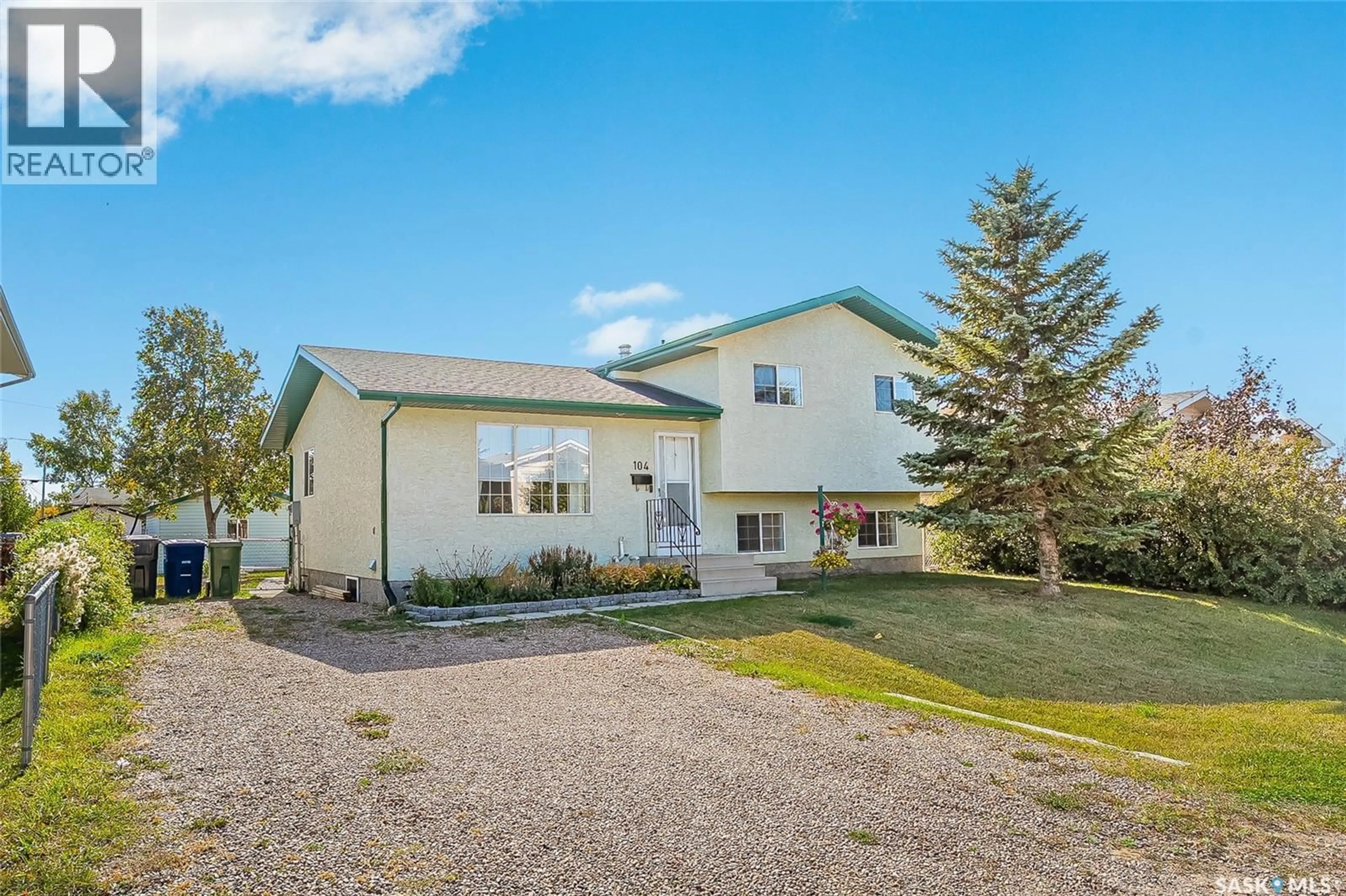 A pic from outside/outdoor area/front of a property/back of a property/a pic from drone, unknown for 104 4TH STREET, Dundurn Saskatchewan S0K1K0