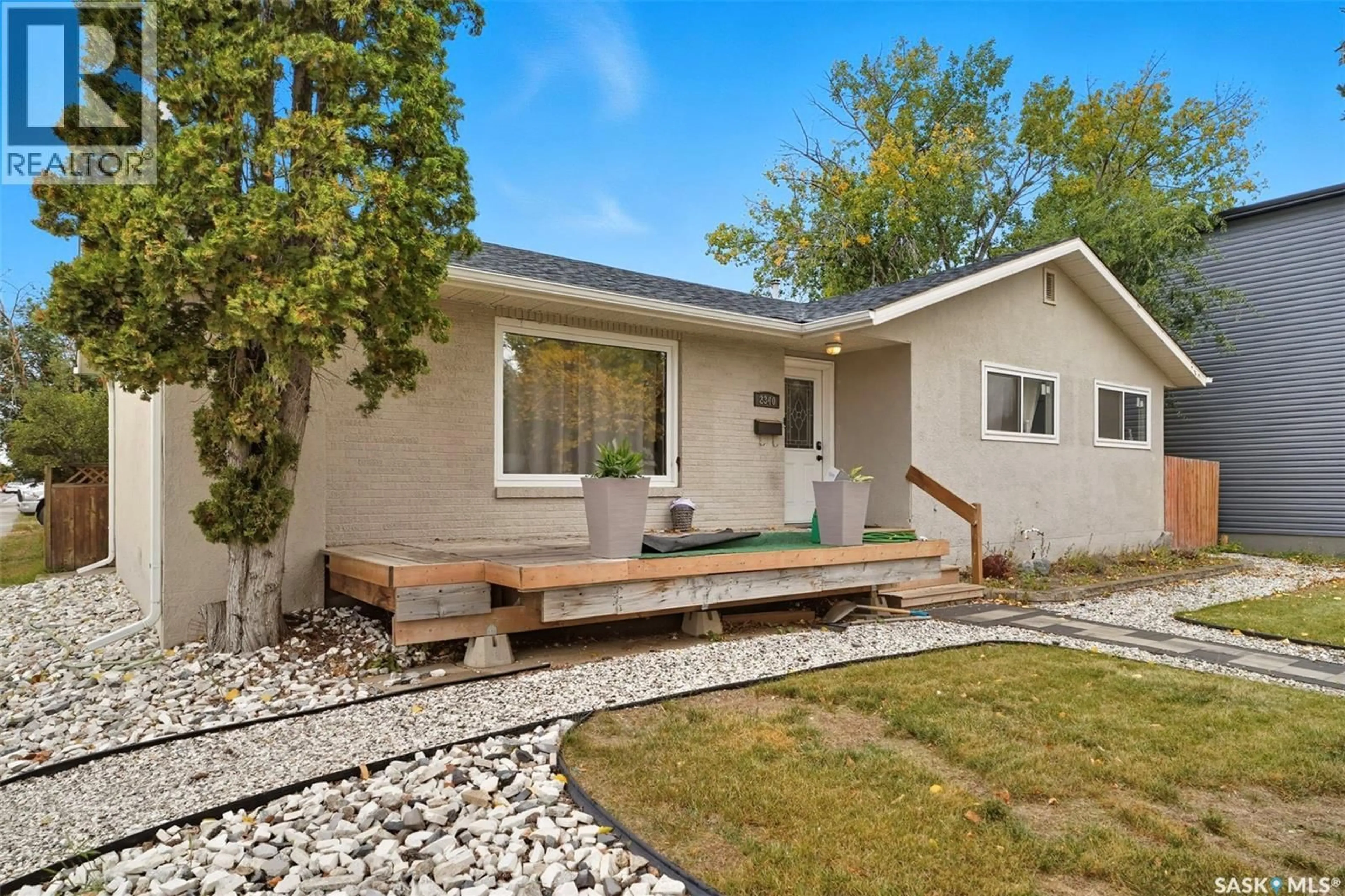 Home with vinyl exterior material, street for 2340 HAULTAIN AVENUE, Saskatoon Saskatchewan S7J1R1