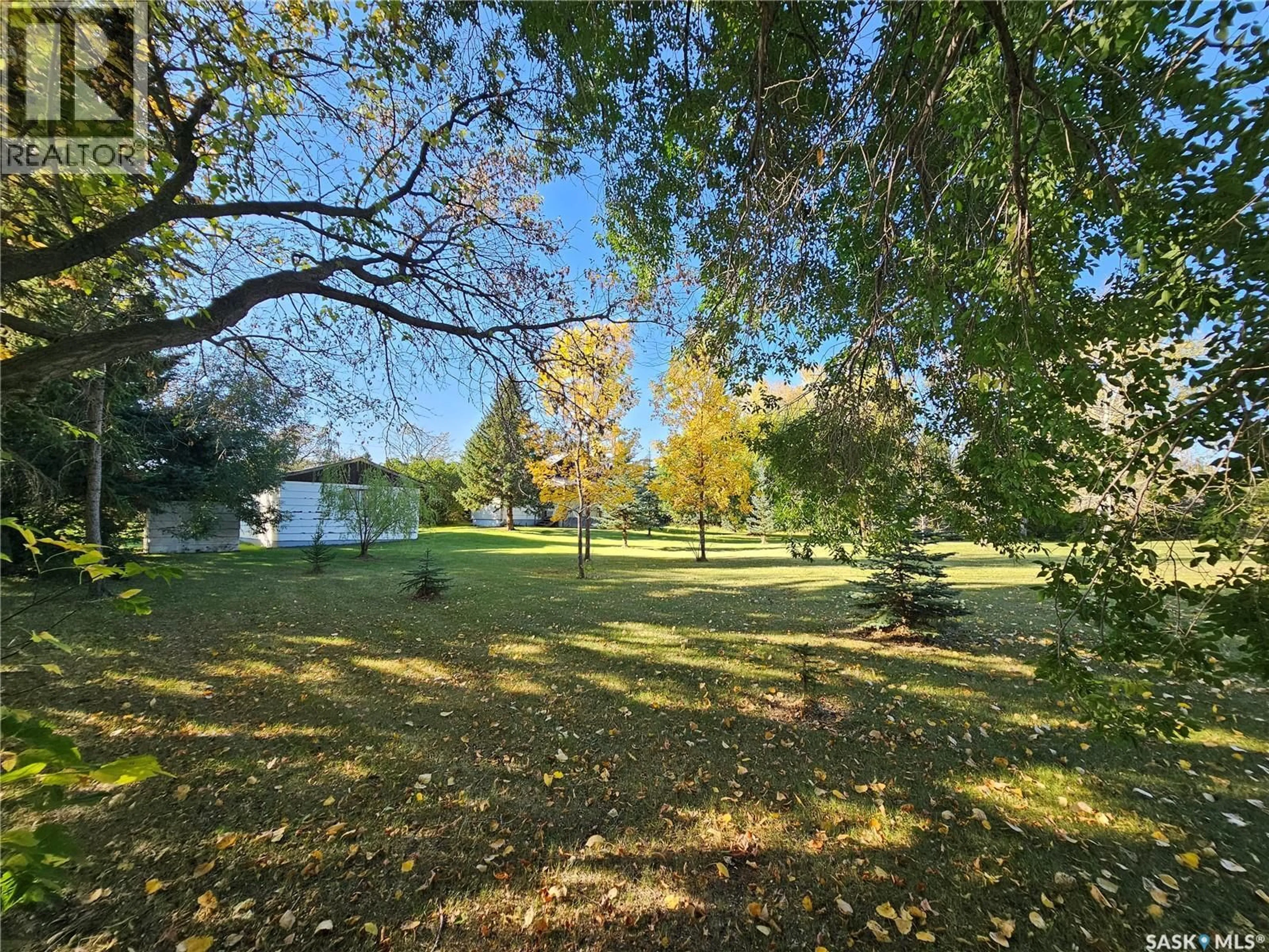 A pic from outside/outdoor area/front of a property/back of a property/a pic from drone, forest/trees view for 24 JOSEPH STREET, Dubuc Saskatchewan S0A0R0