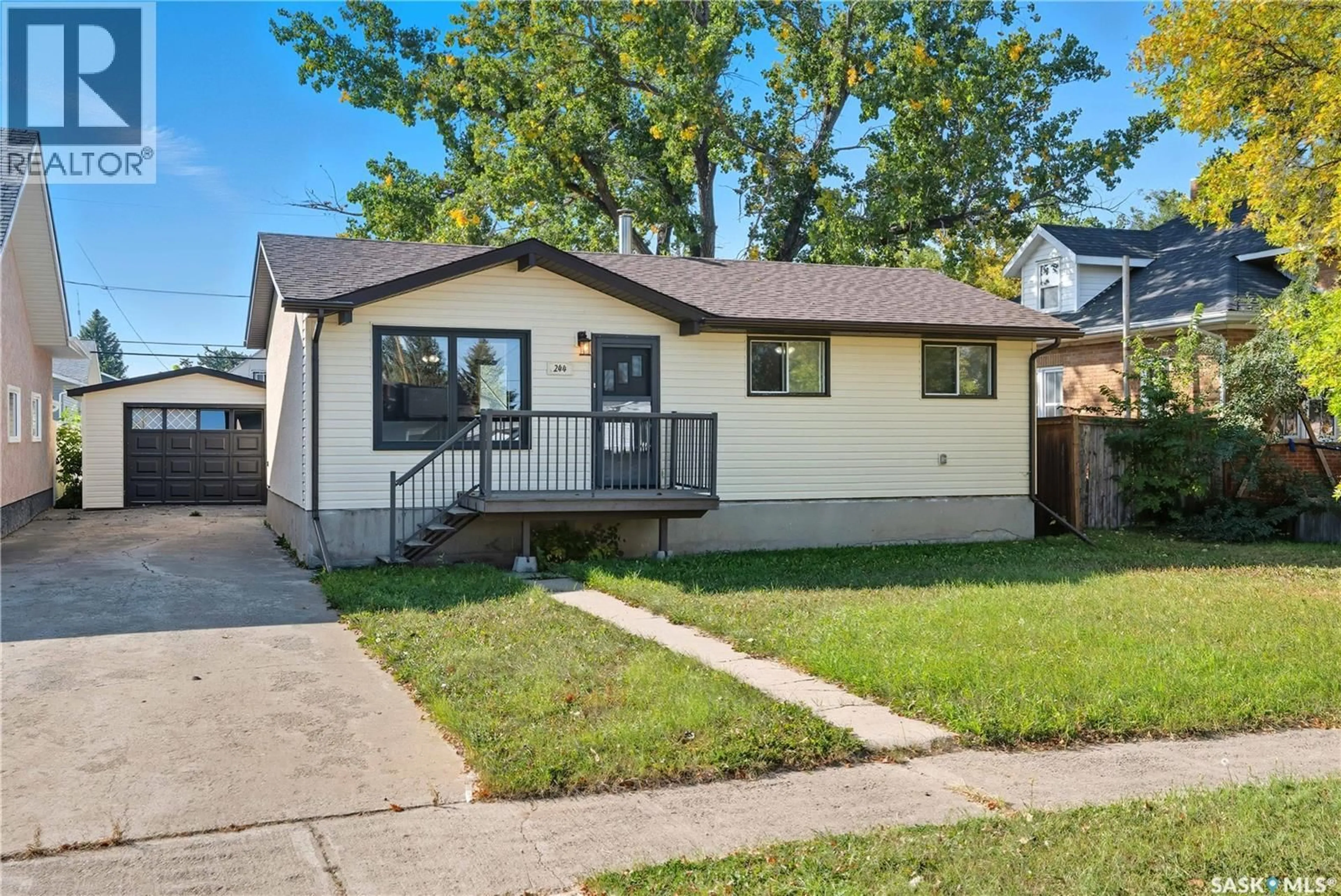Home with vinyl exterior material, street for 244 5TH AVENUE, Gravelbourg Saskatchewan S0H1X0