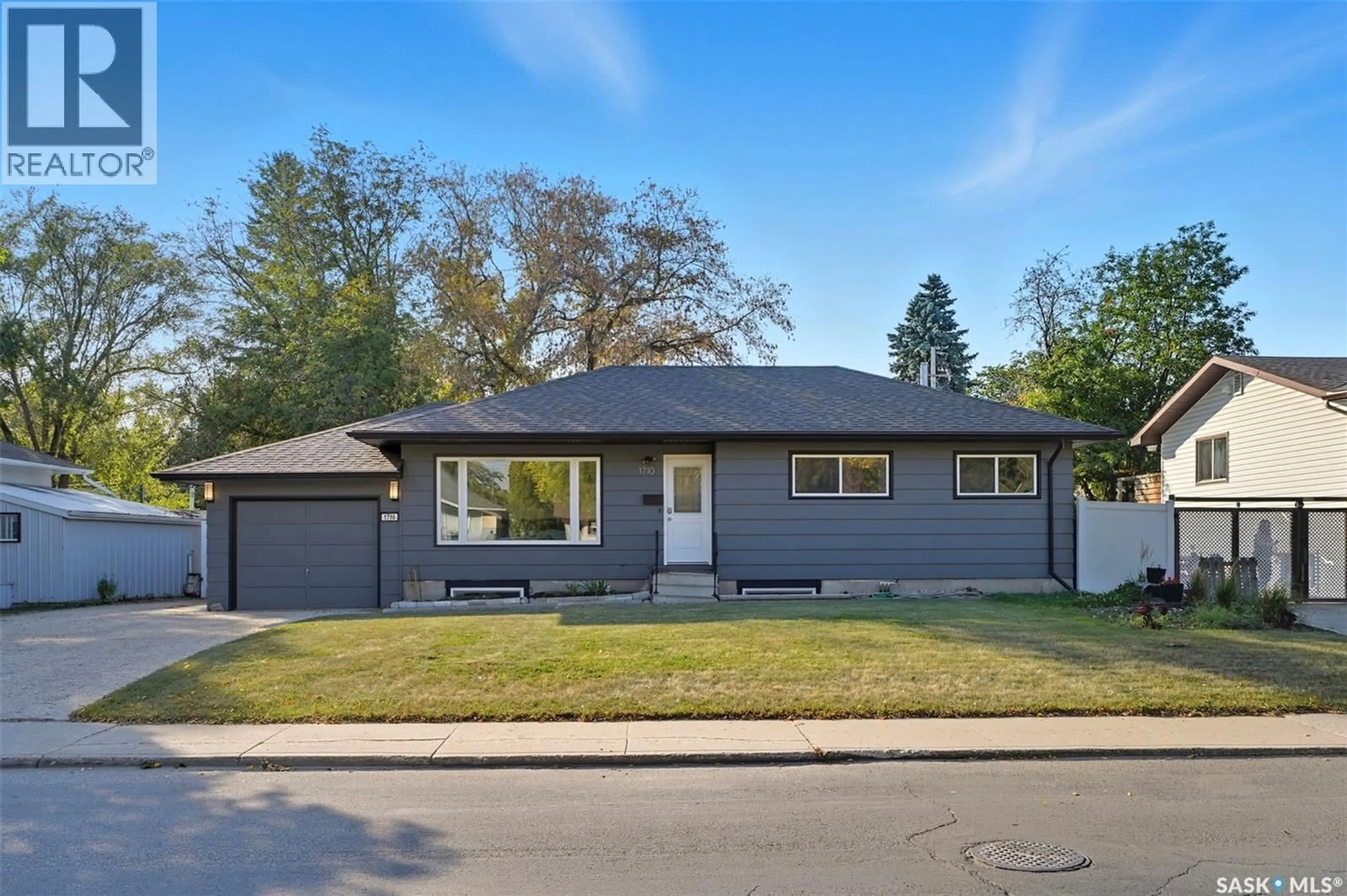 Home with vinyl exterior material, street for 1710 PRESTON AVENUE, Saskatoon Saskatchewan S7H2V8