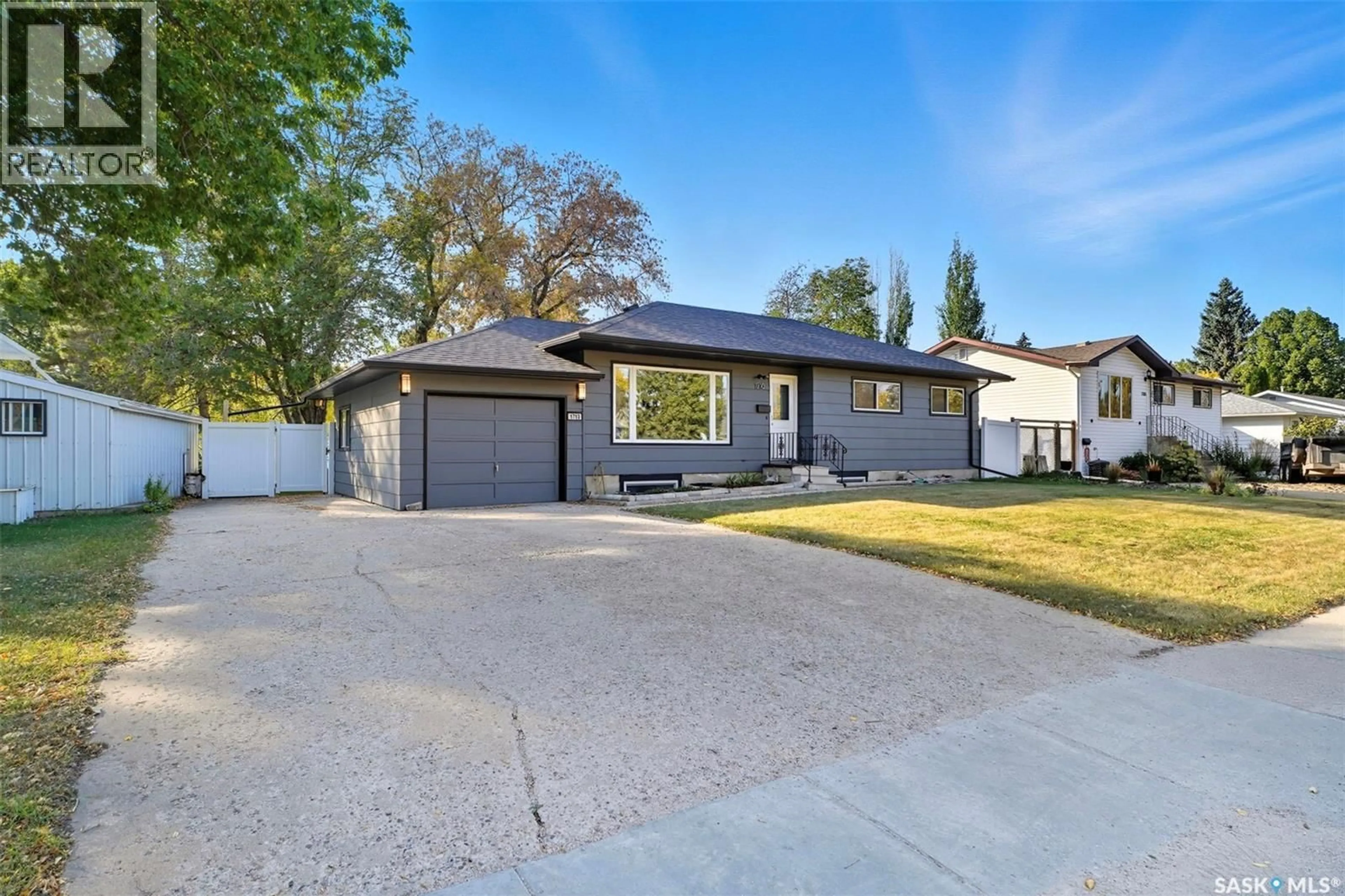 Home with vinyl exterior material, street for 1710 PRESTON AVENUE, Saskatoon Saskatchewan S7H2V8