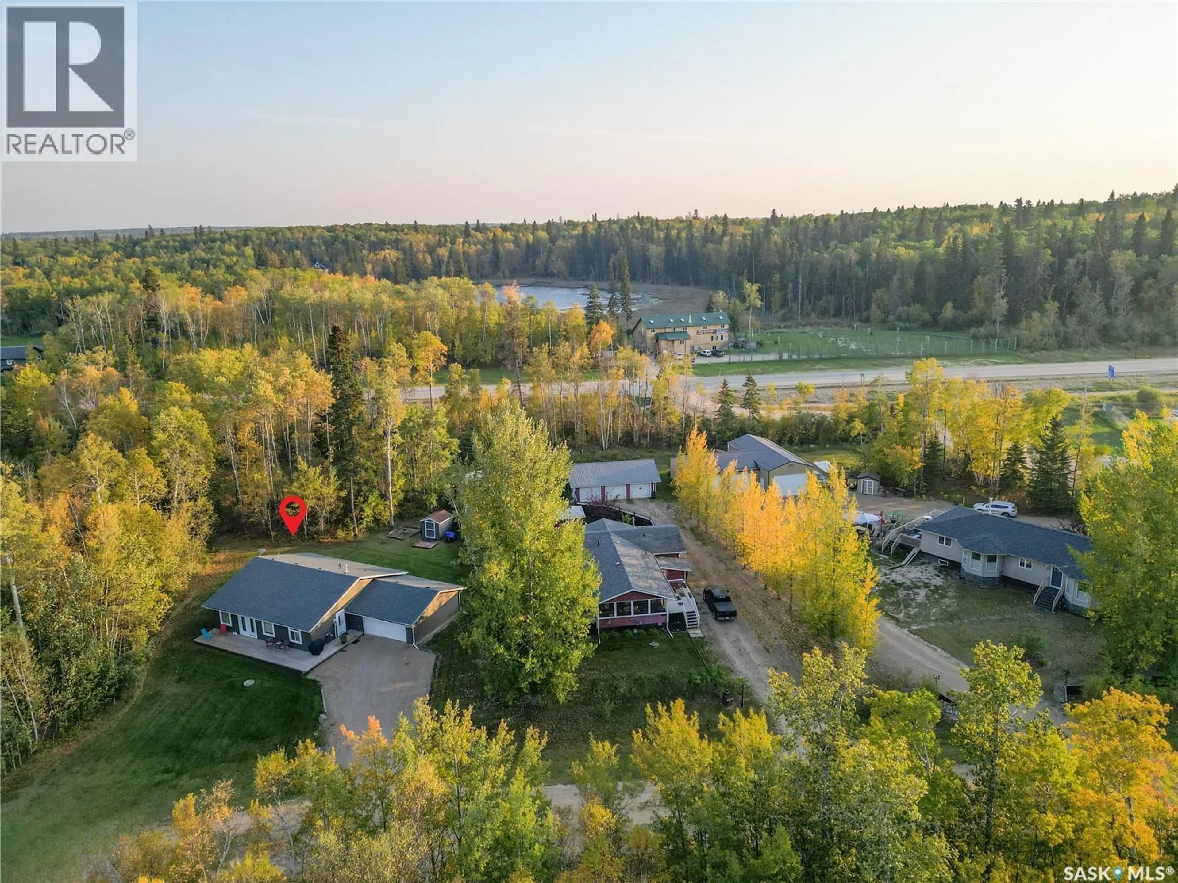 A pic from outside/outdoor area/front of a property/back of a property/a pic from drone, forest/trees view for 105 CRESTVIEW DRIVE, Lakeland Rm No. 521 Saskatchewan S0J0N0