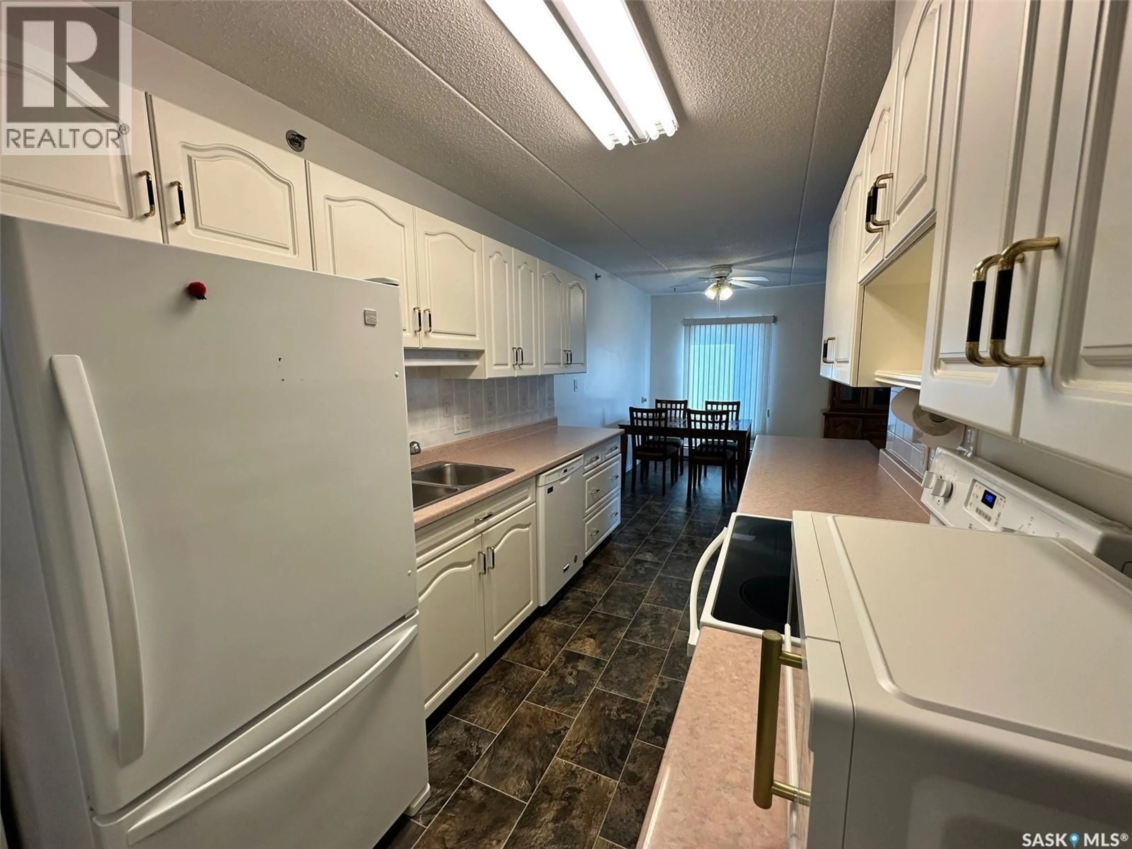 Standard kitchen, unknown for W - 204 201 STOVEL AVENUE, Melfort Saskatchewan S0E1A0