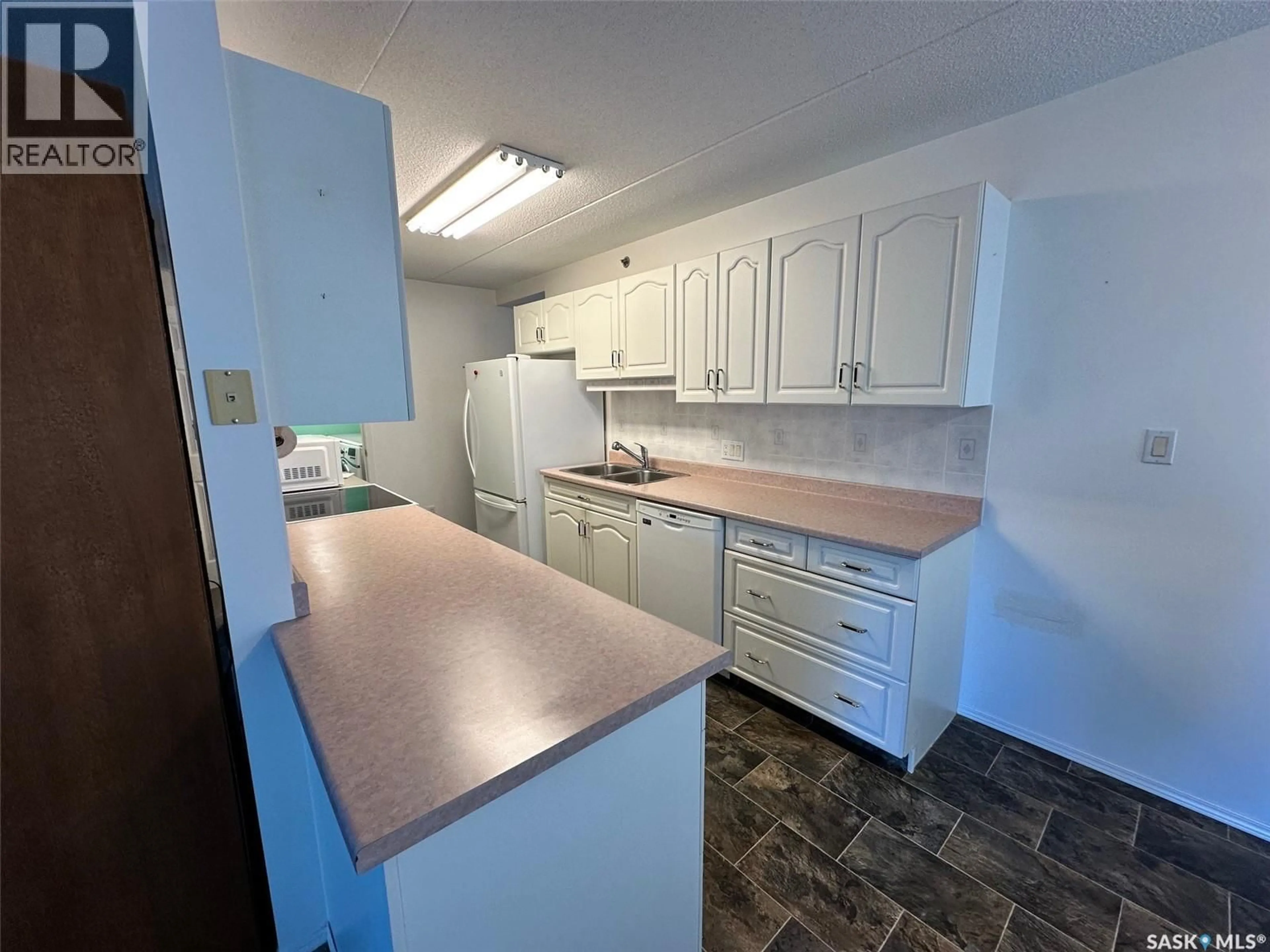 Standard kitchen, unknown for W - 204 201 STOVEL AVENUE, Melfort Saskatchewan S0E1A0