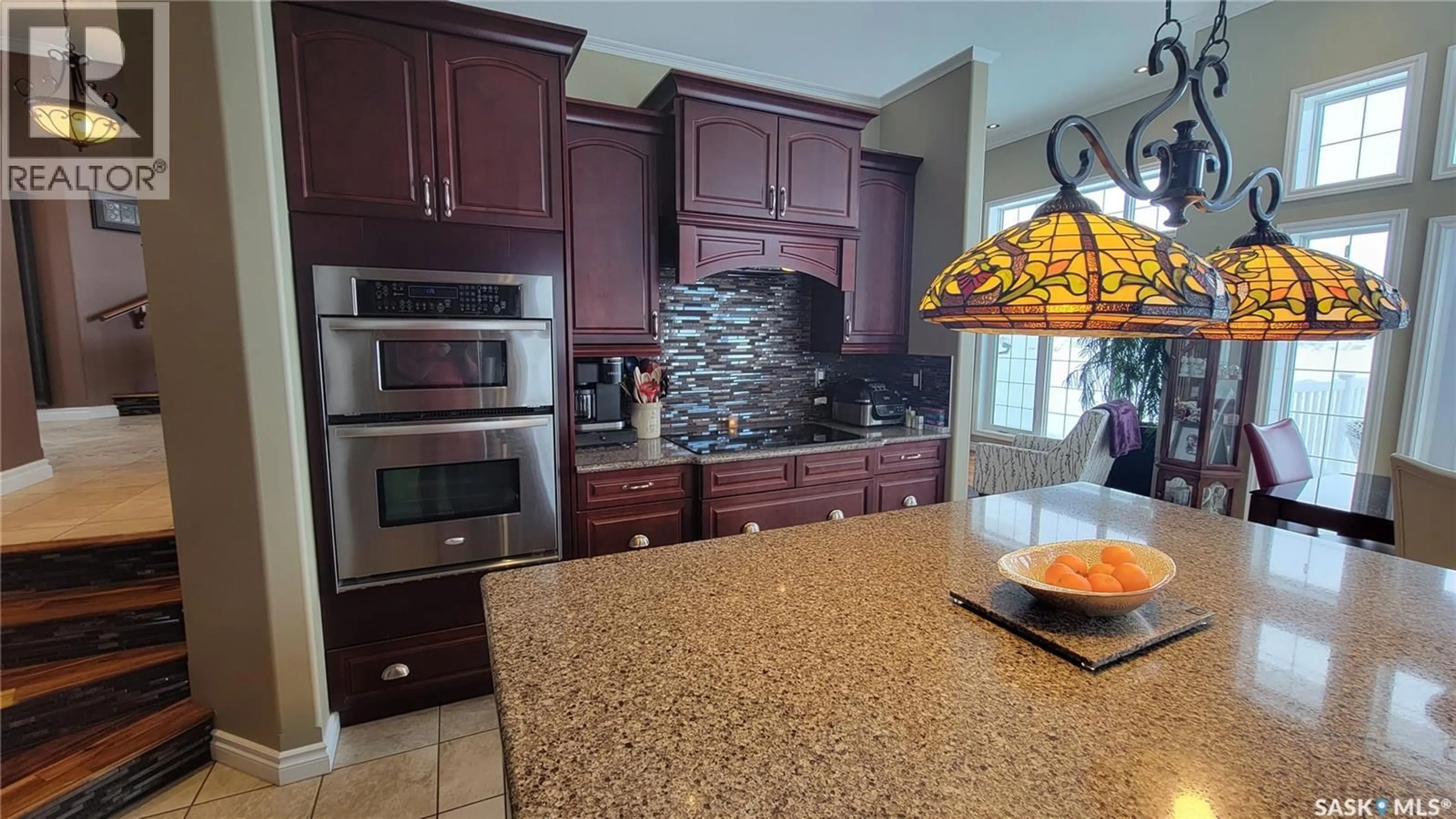 Open concept kitchen, ceramic/tile floor for E - 408 5TH STREET, Wilkie Saskatchewan S0K4W0