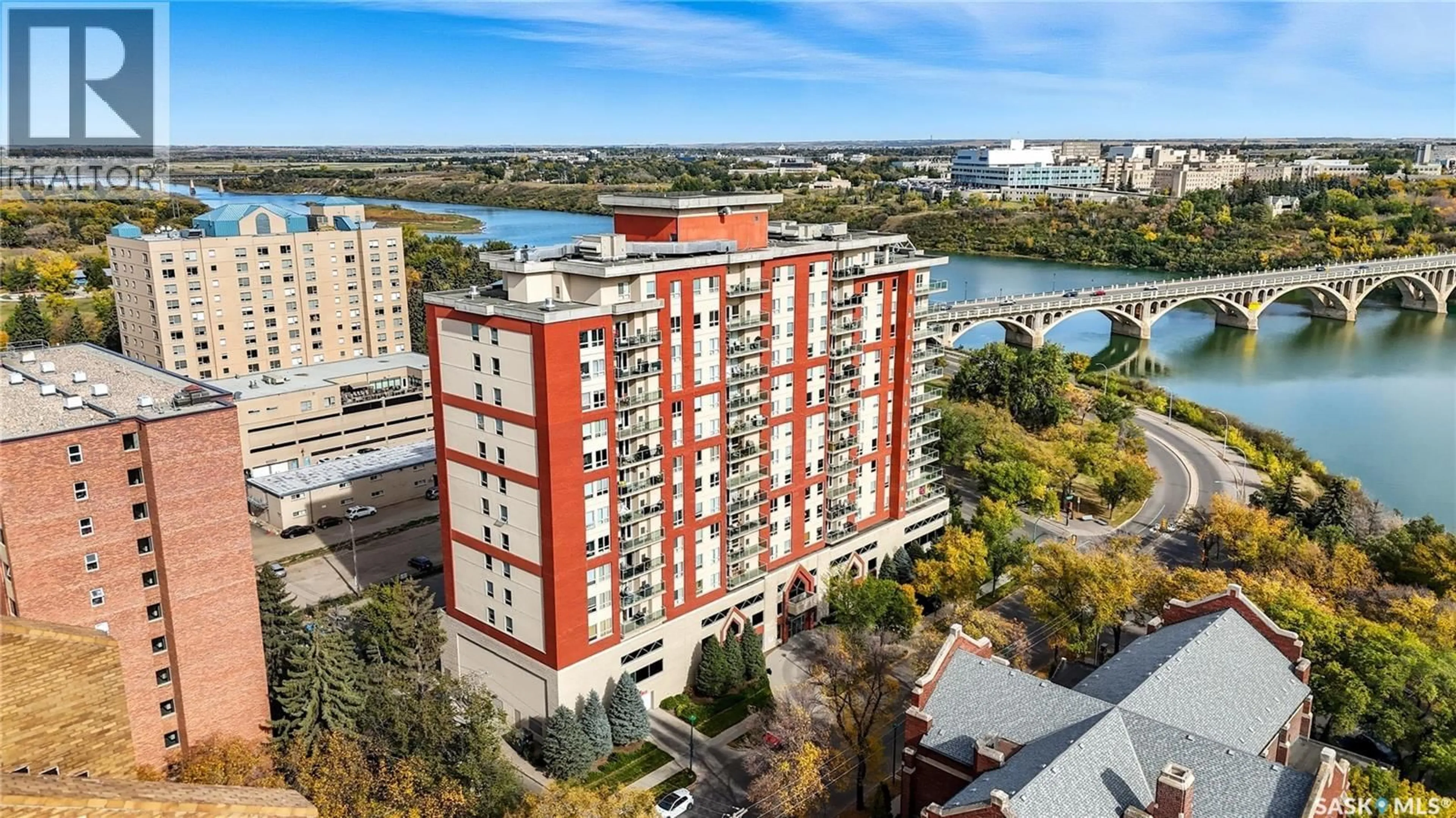 A pic from outside/outdoor area/front of a property/back of a property/a pic from drone, unknown for 902 - 609 SPADINA CRESCENT, Saskatoon Saskatchewan S7K0G8