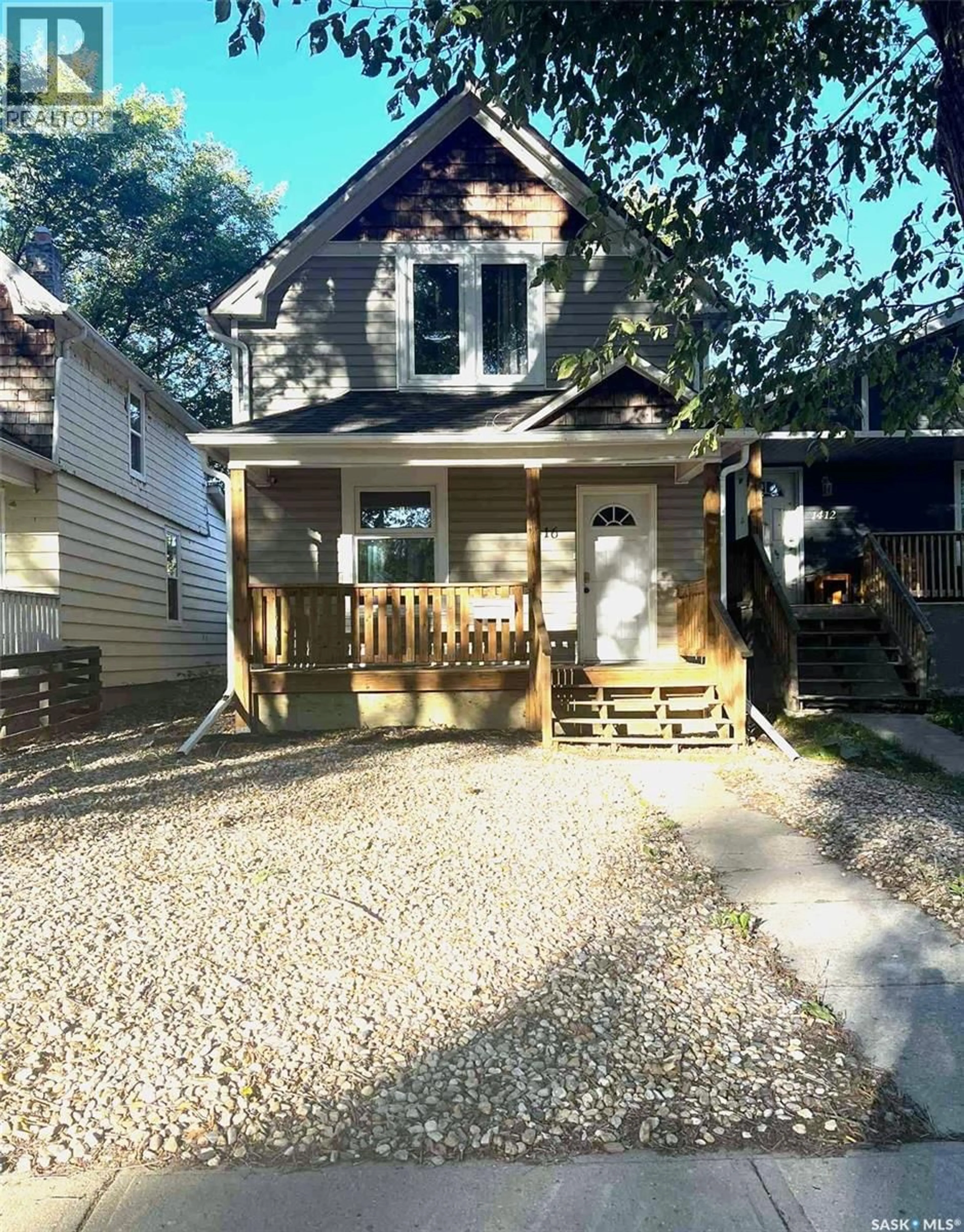Home with vinyl exterior material, street for 1416 GARNET STREET, Regina Saskatchewan S4T2Y5