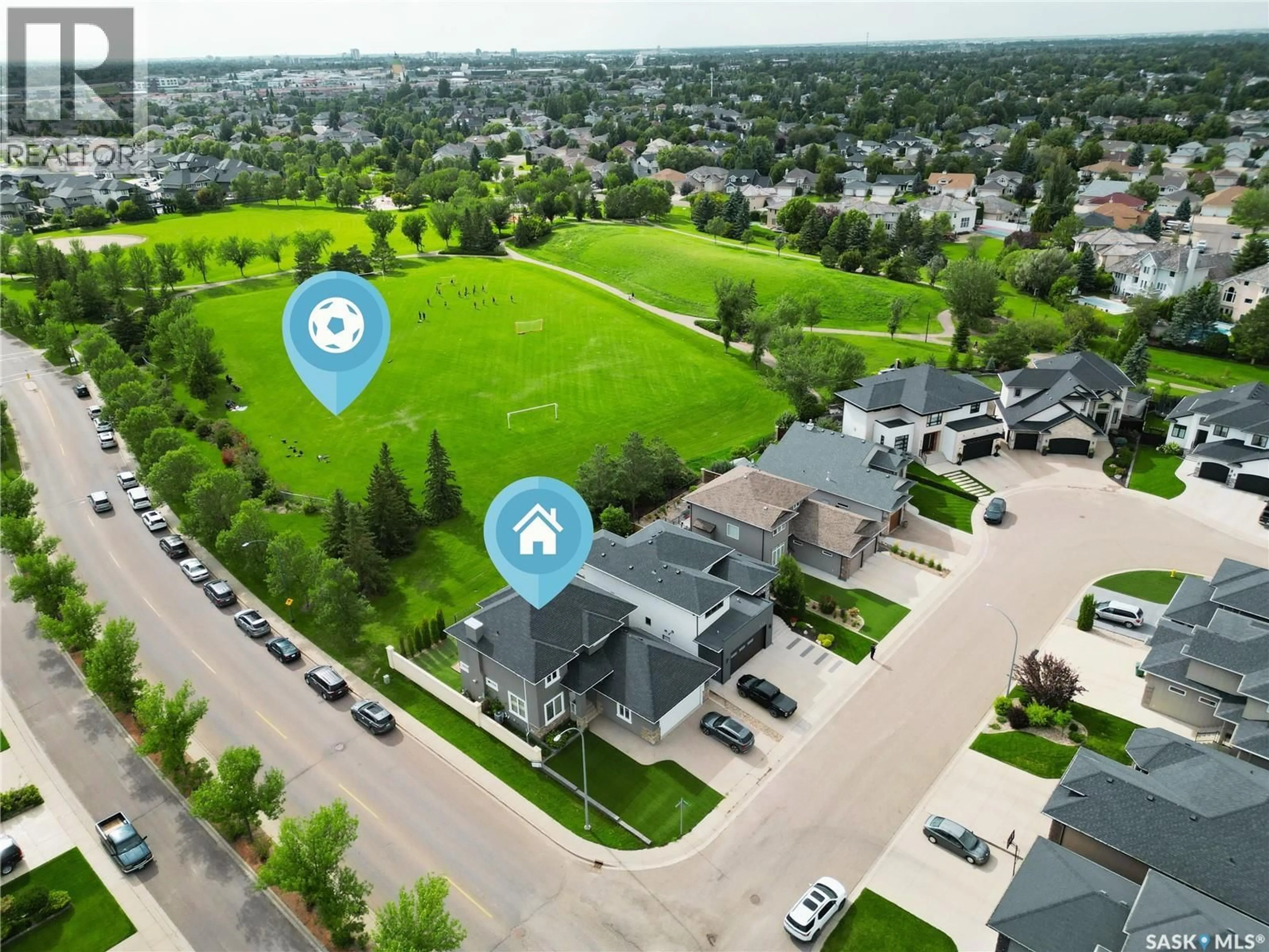 A pic from outside/outdoor area/front of a property/back of a property/a pic from drone, street for 438 HORLICK MANOR, Saskatoon Saskatchewan S7N2J6