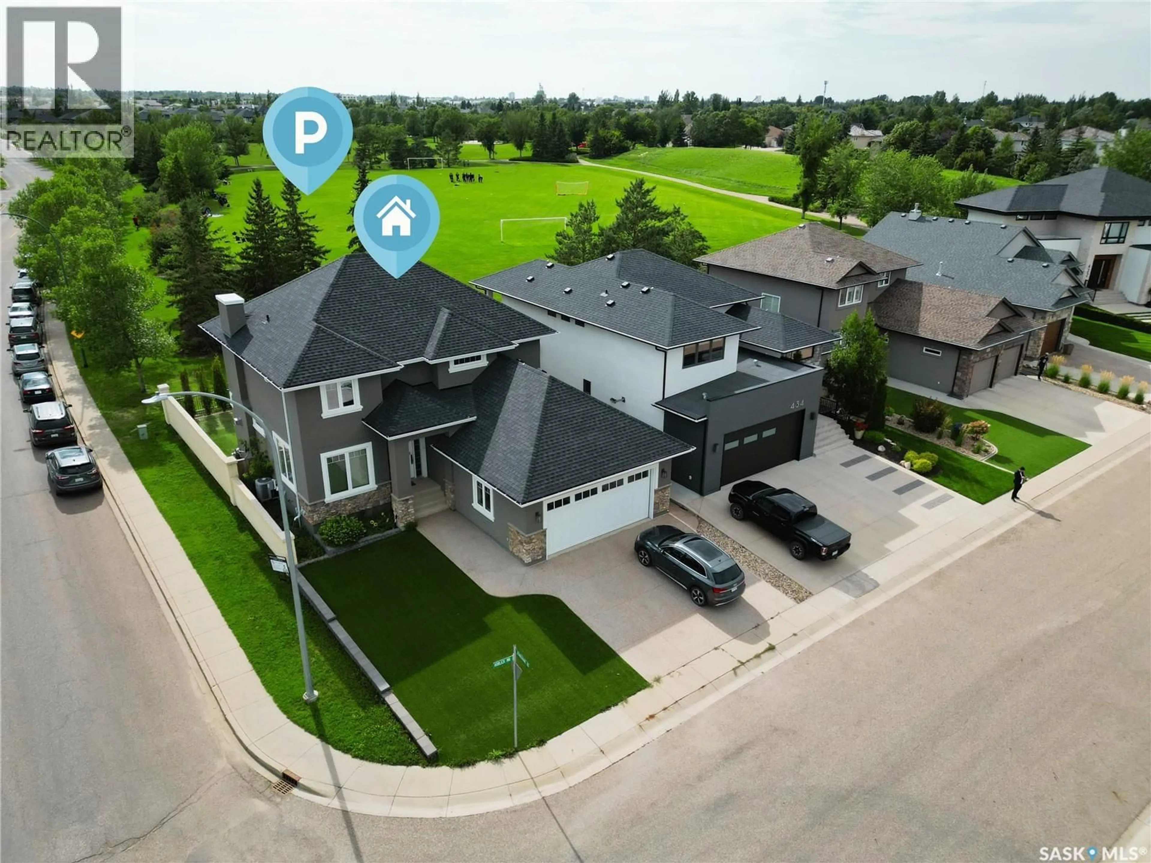 A pic from outside/outdoor area/front of a property/back of a property/a pic from drone, street for 438 HORLICK MANOR, Saskatoon Saskatchewan S7N2J6