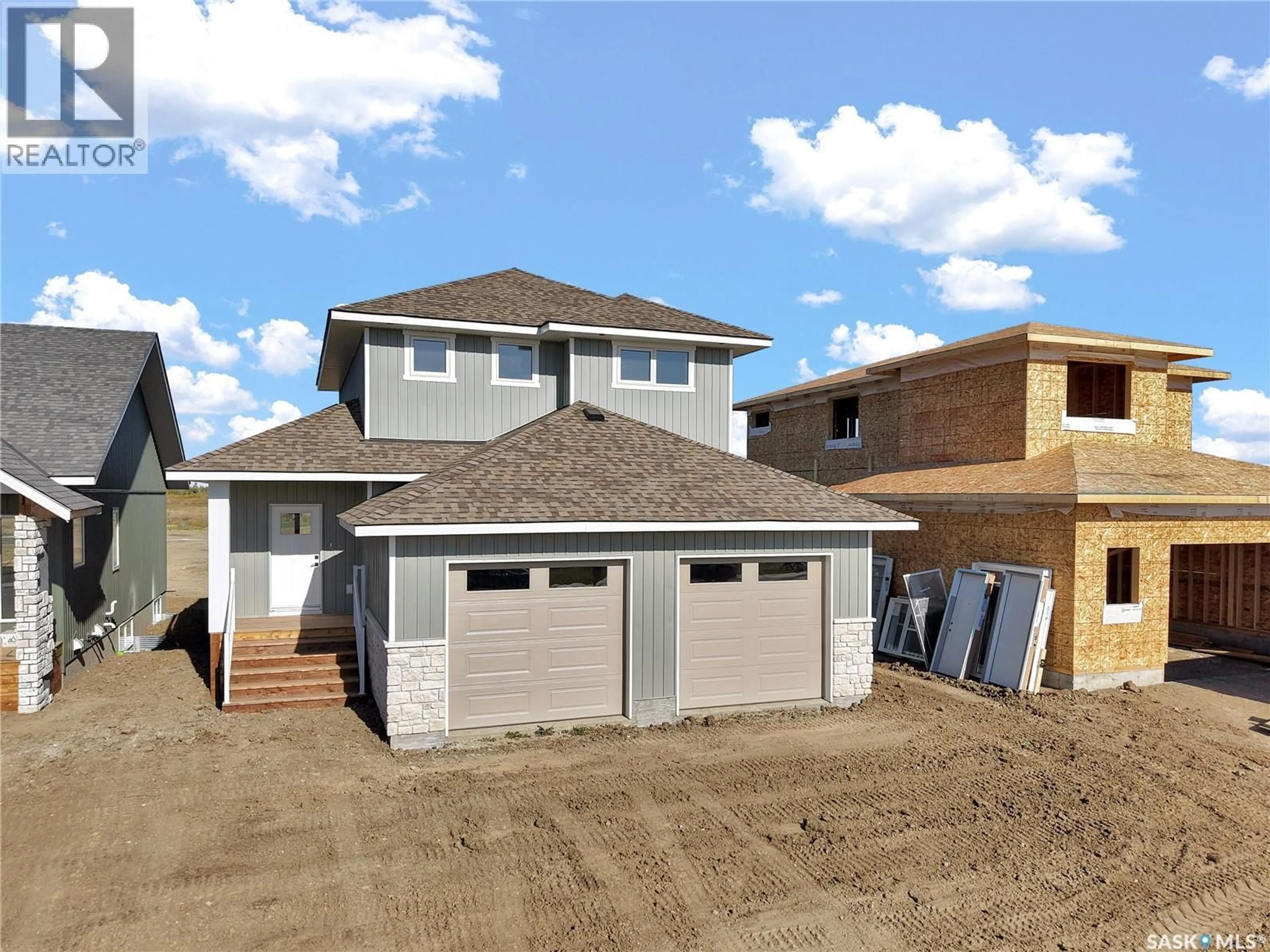 Home with vinyl exterior material, street for 109 EMMA CRESCENT, Martensville Saskatchewan S0K2T1