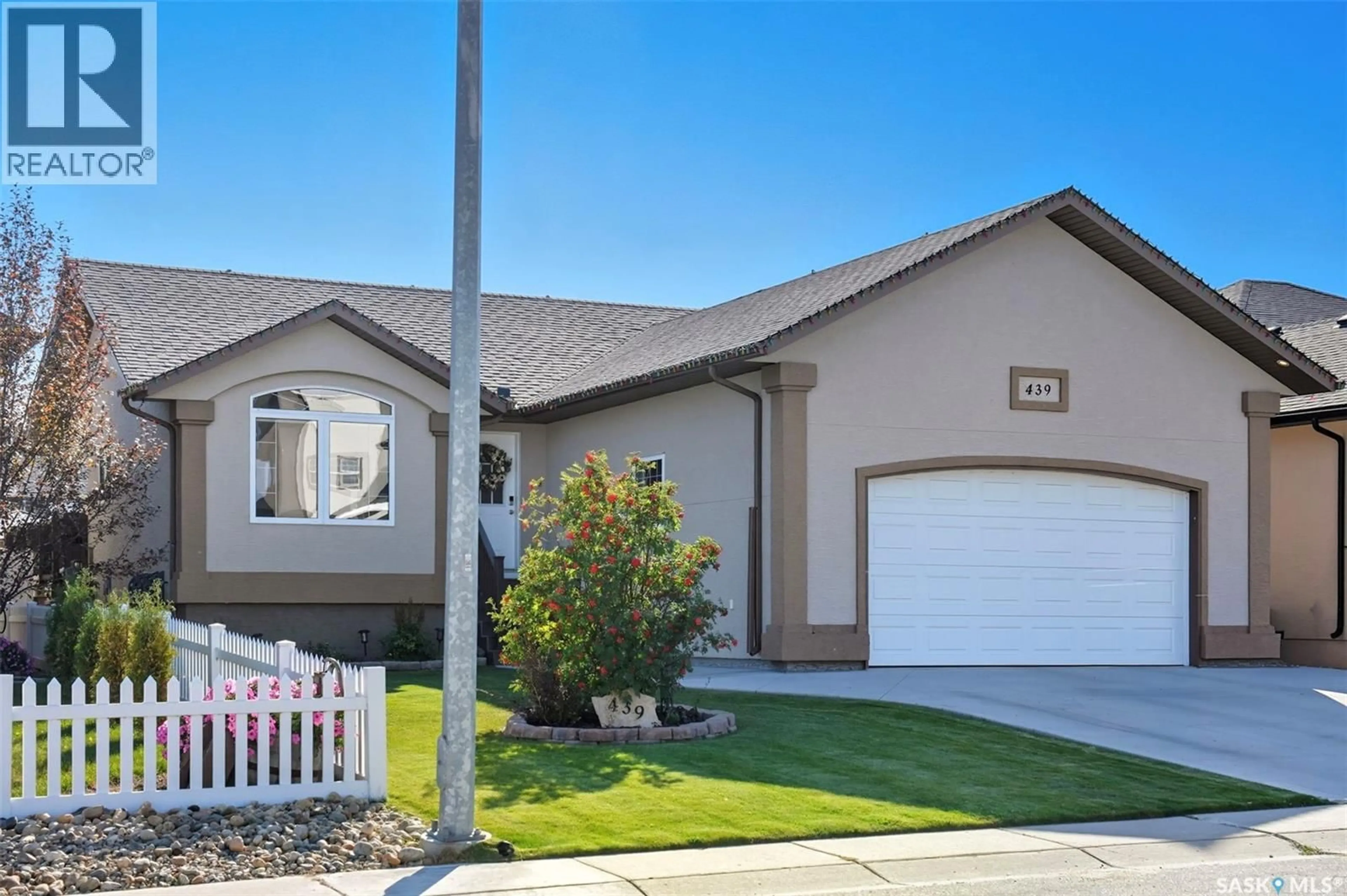 Home with vinyl exterior material, street for 439 SNEAD CRESCENT, Warman Saskatchewan S0K4S1