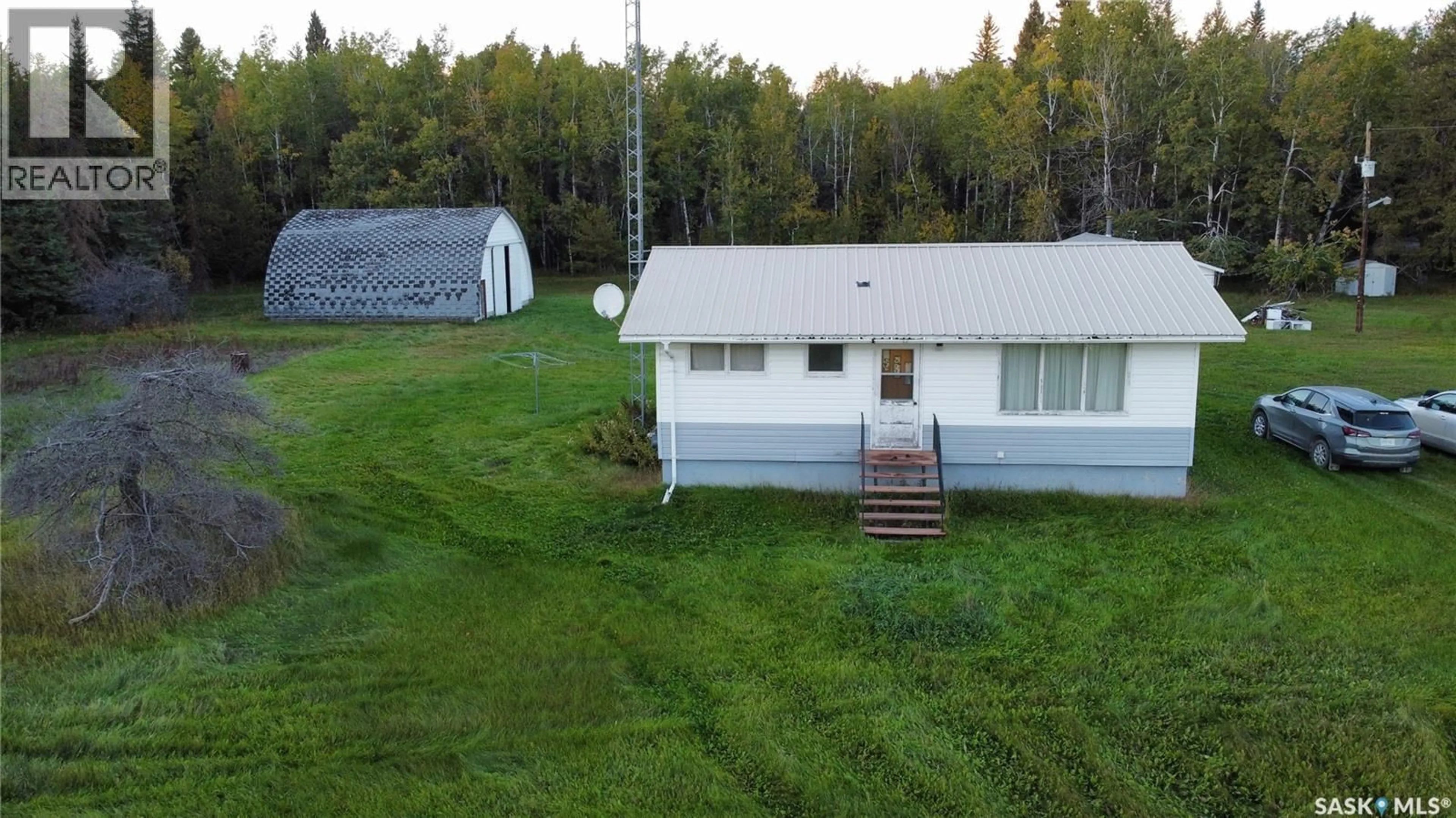 A pic from outside/outdoor area/front of a property/back of a property/a pic from drone, building for BROWN ACREAGE, Torch River Rm No. 488 Saskatchewan S0J0M0