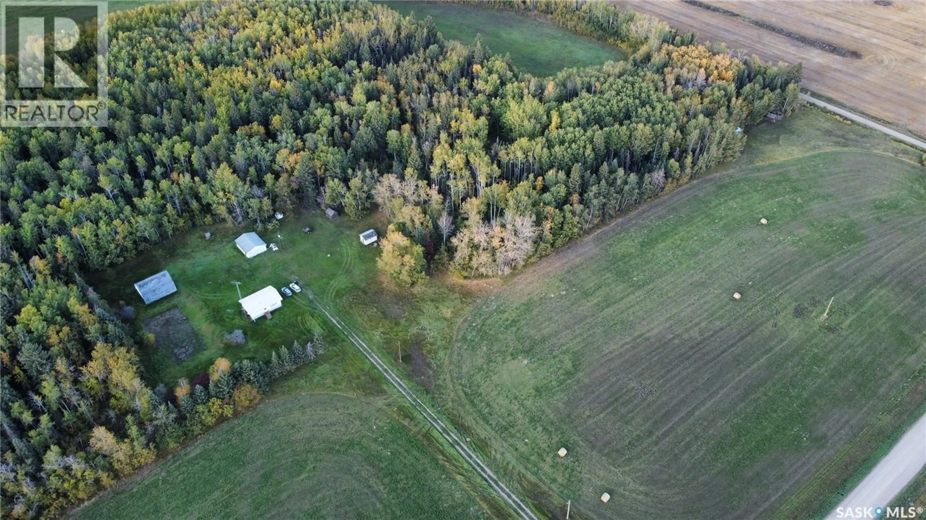 A pic from outside/outdoor area/front of a property/back of a property/a pic from drone, forest/trees view for BROWN ACREAGE, Torch River Rm No. 488 Saskatchewan S0J0M0
