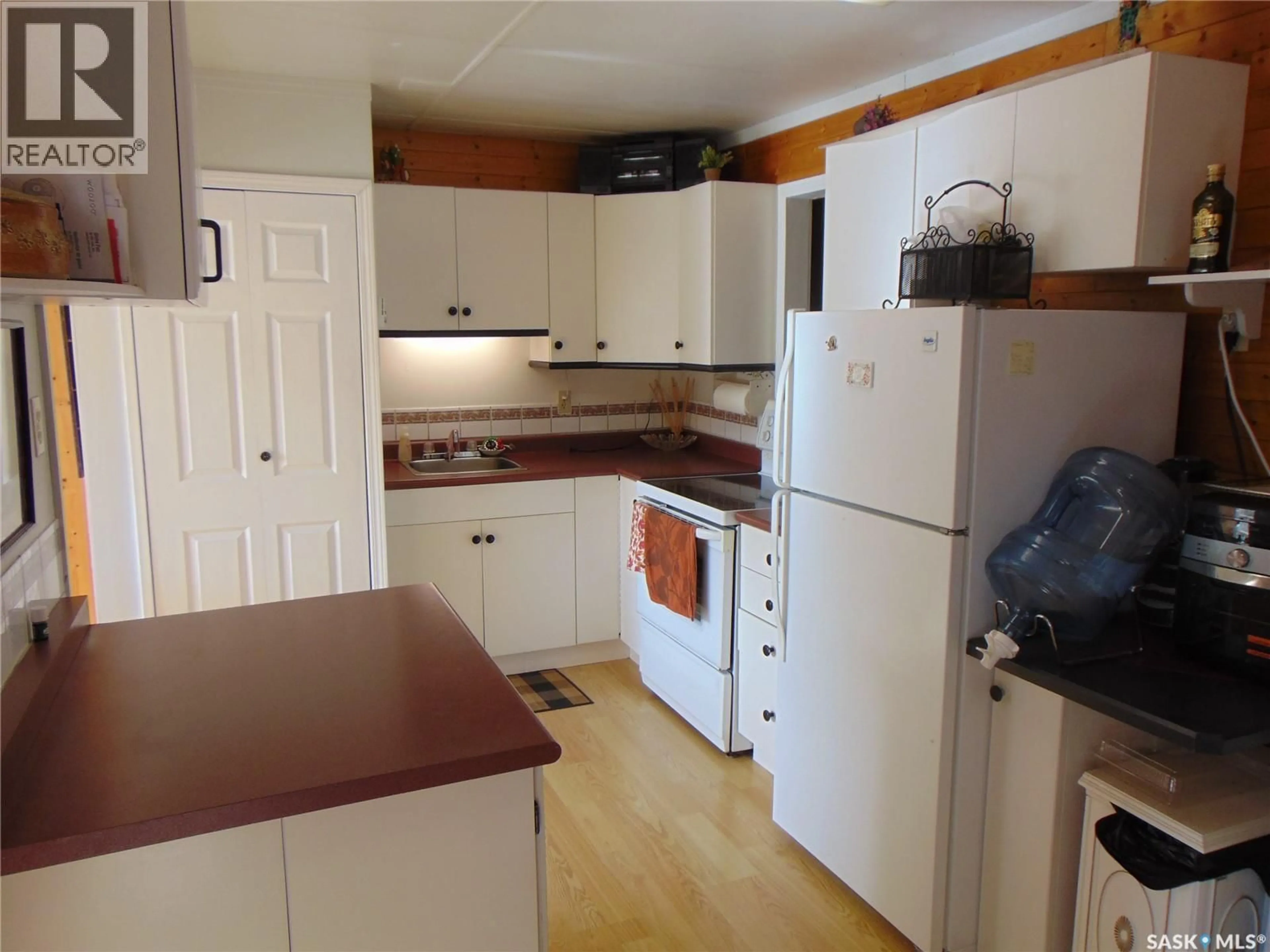 Standard kitchen, wood/laminate floor for 113 FOSTER STREET, Lakeland Rm No. 521 Saskatchewan S0J0N0